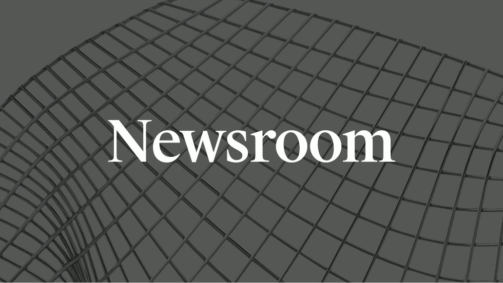 "Newsroom" in white text on a grey background.