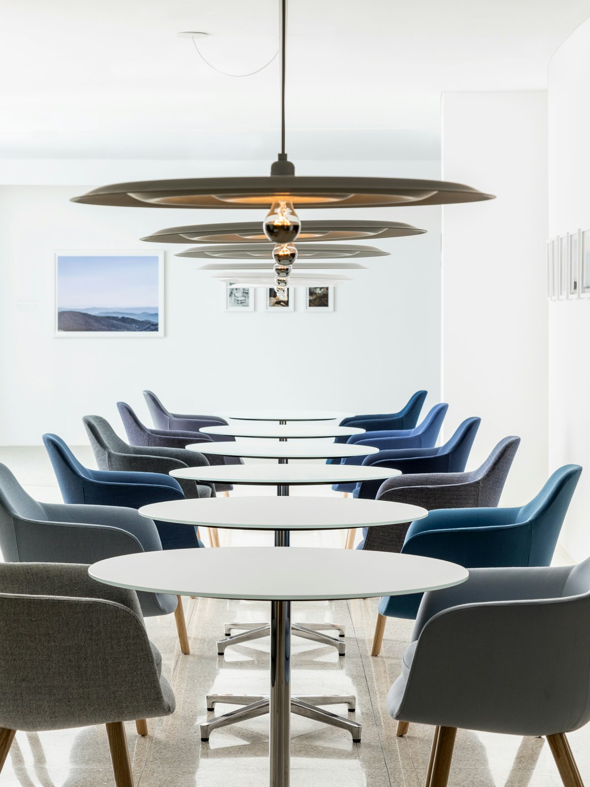 Saiba Tables with Saiba Armchairs.