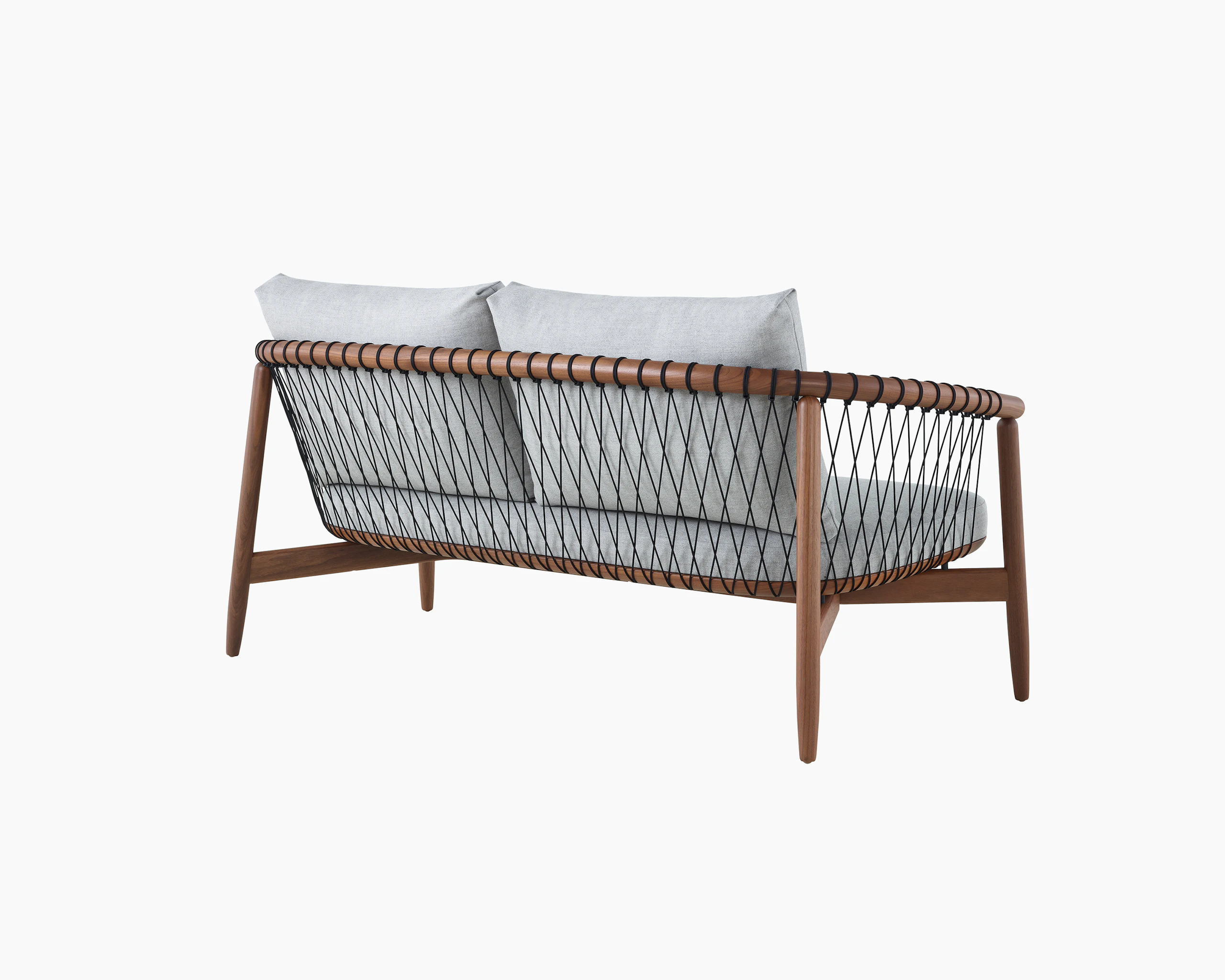 A Crosshatch Settee with a walnut frame, black cords, and a light neutral fabric. Viewed from the back.