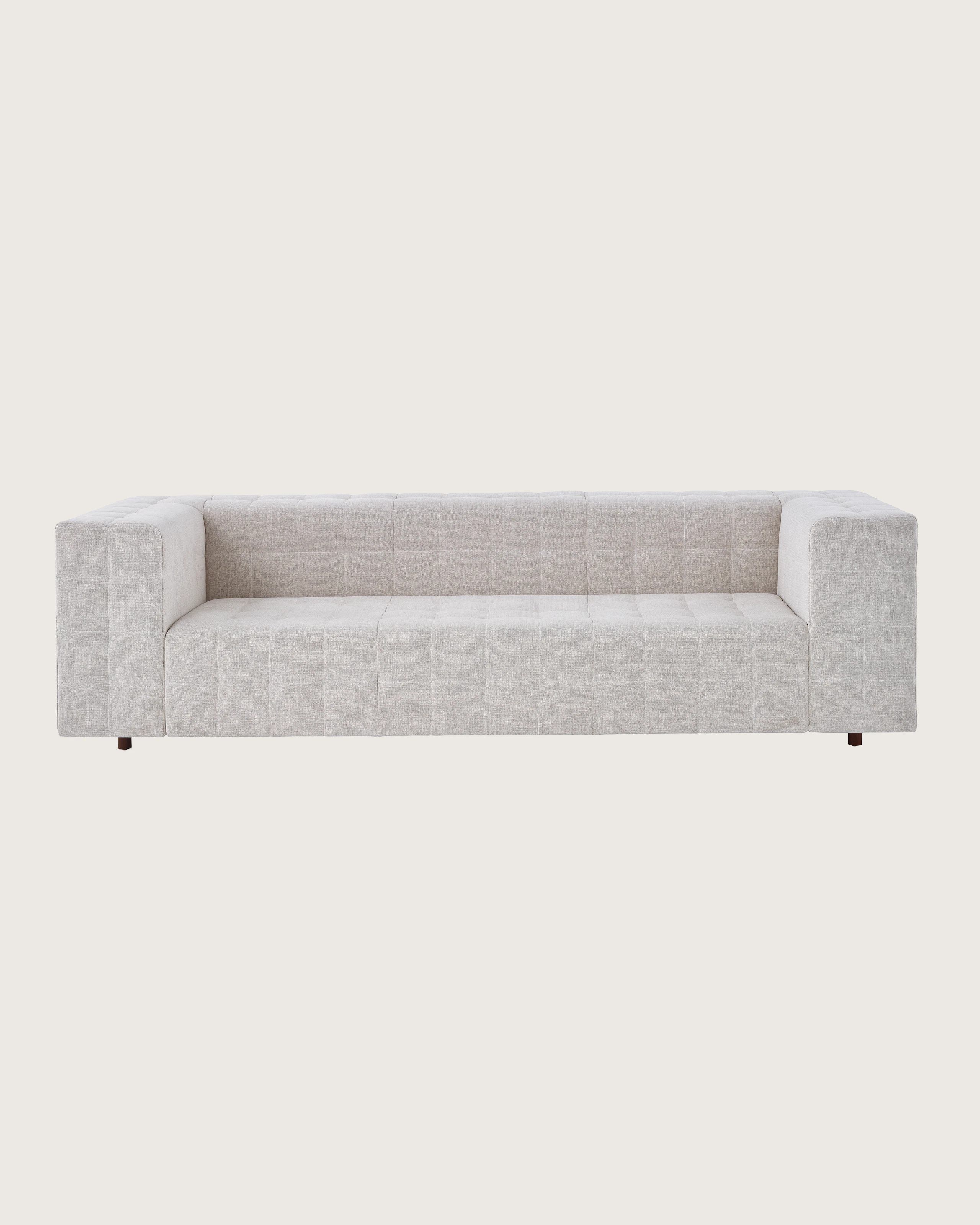 Rapport Sofa with walnut legs.