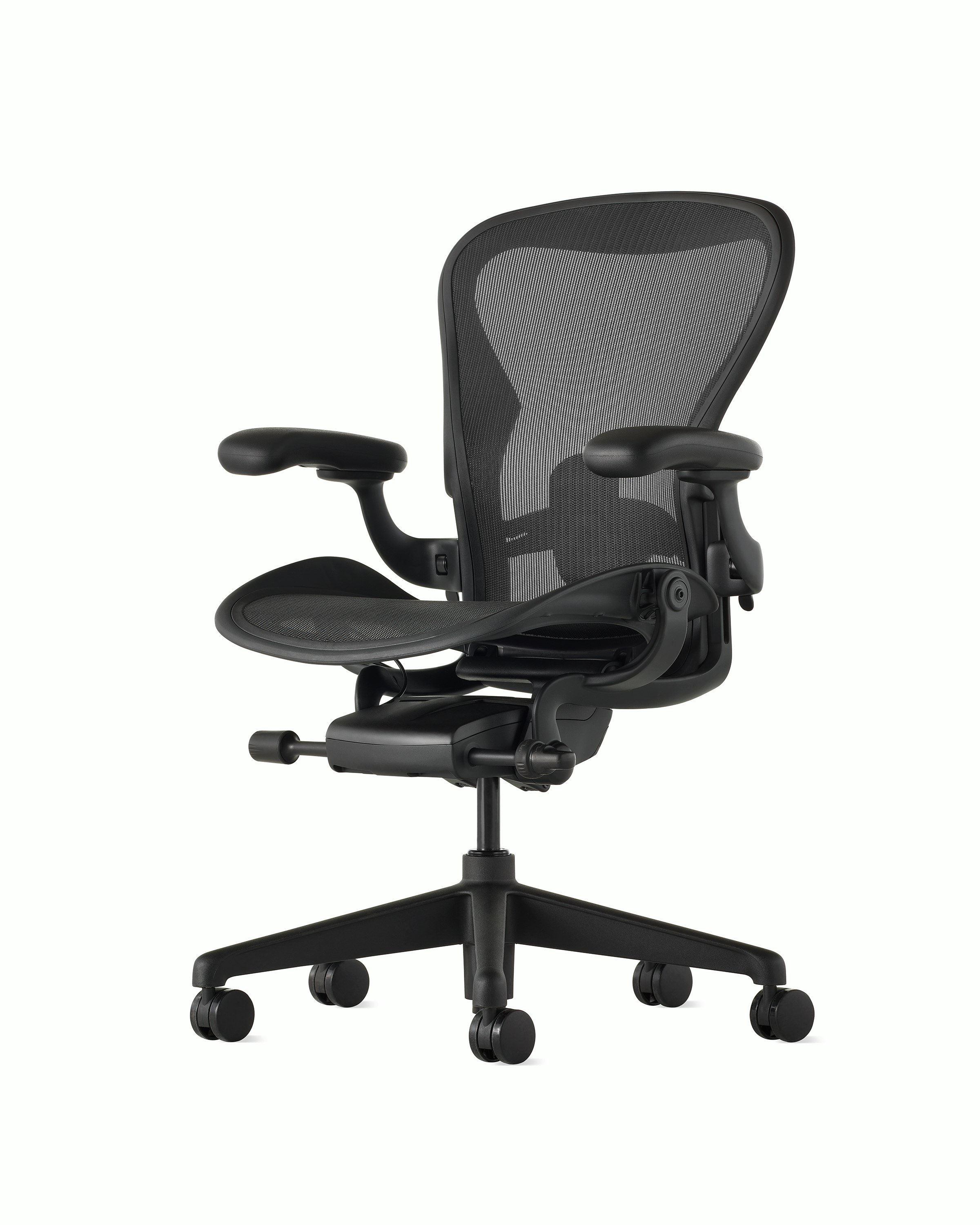 Black matte Aeron Chair on a white background with a 5-star base and ergonomic back support, angled view of the chair front.