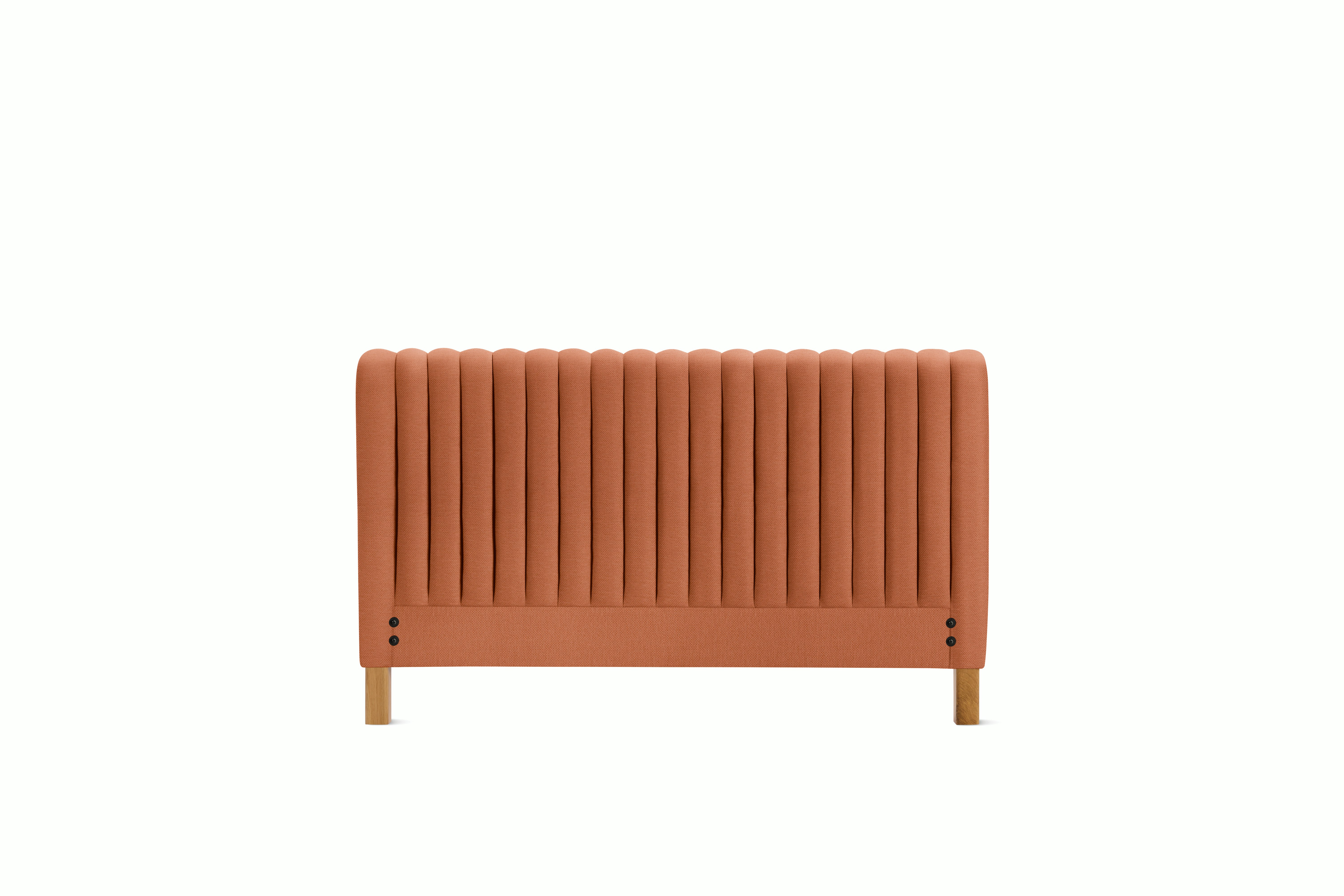 A Charlotte Headboard in Caramelized viewed from an angle.