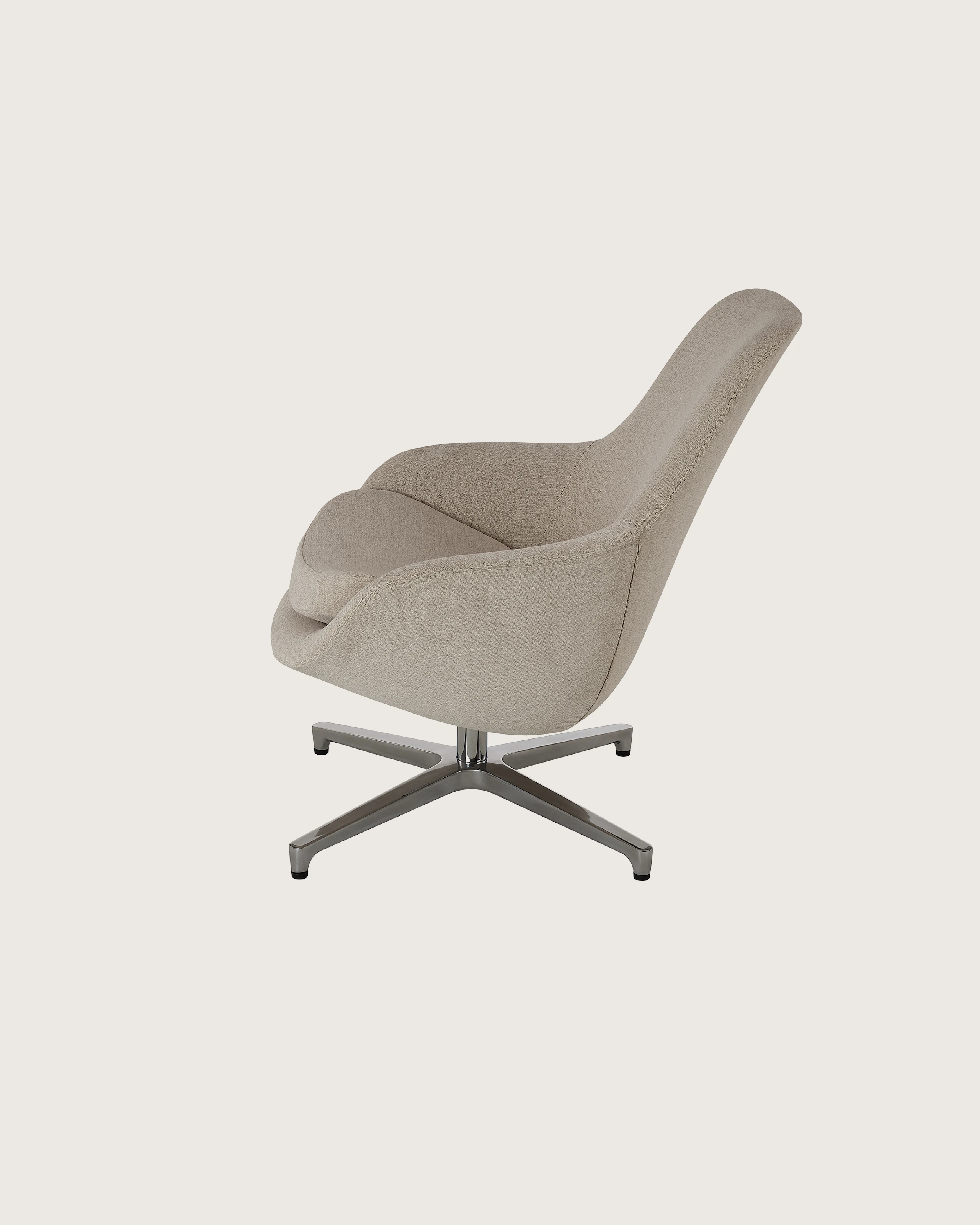 Saiba Lounge Chair designed by Naoto Fukasawa upholstered in Vionette in Desert Mix with a polished aluminum base, shown in profile on a white sweep.