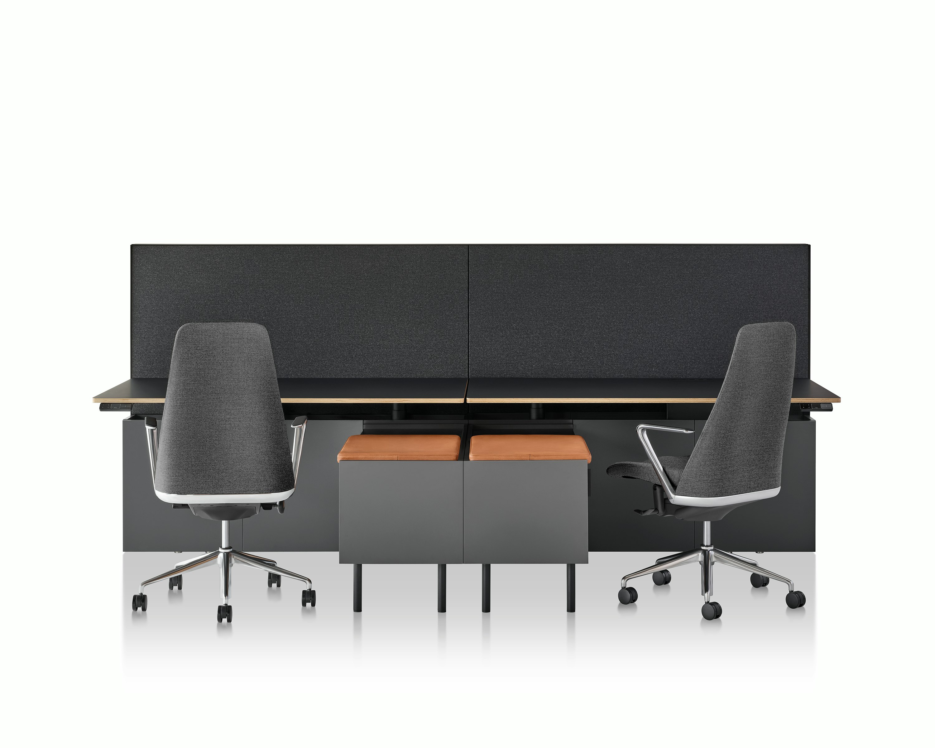 A Geiger One Casegoods bench system with two workstations, both with Taper Chairs and freestanding credenzas with seat pads.