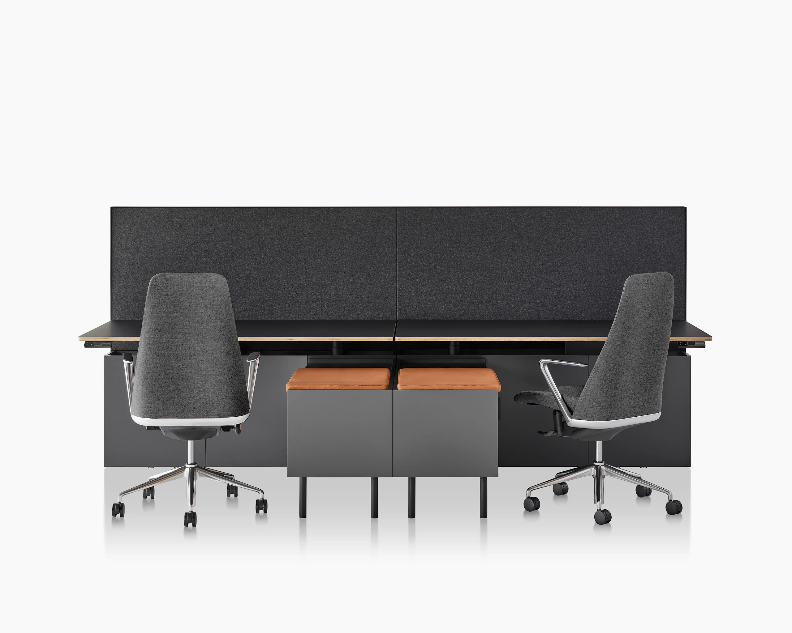 A Geiger One Casegoods bench system with two workstations, both with Taper Chairs and freestanding credenzas with seat pads.