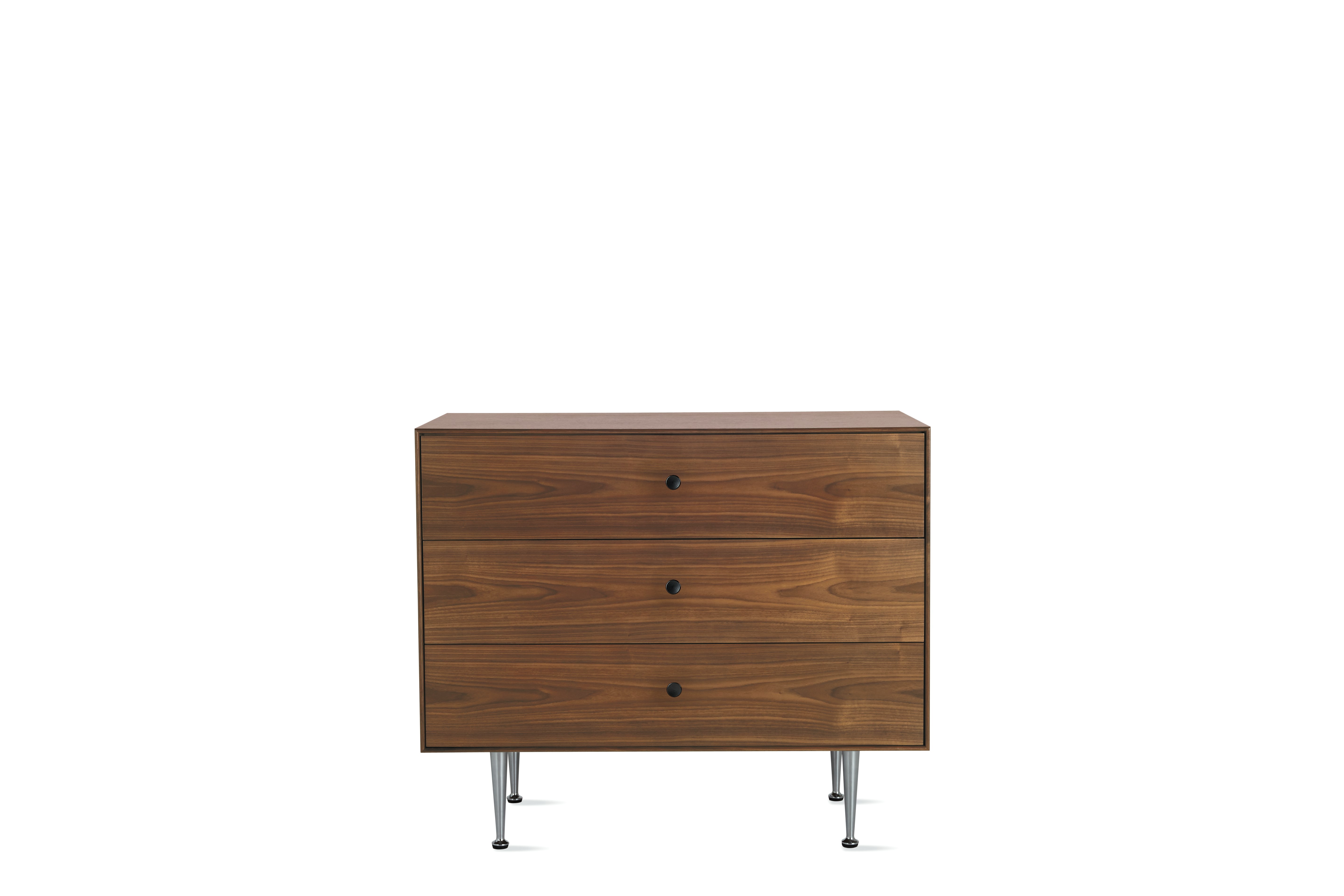 A Nelson Thin Edge 3-Drawer Chest in Walnut and Black viewed from the front.