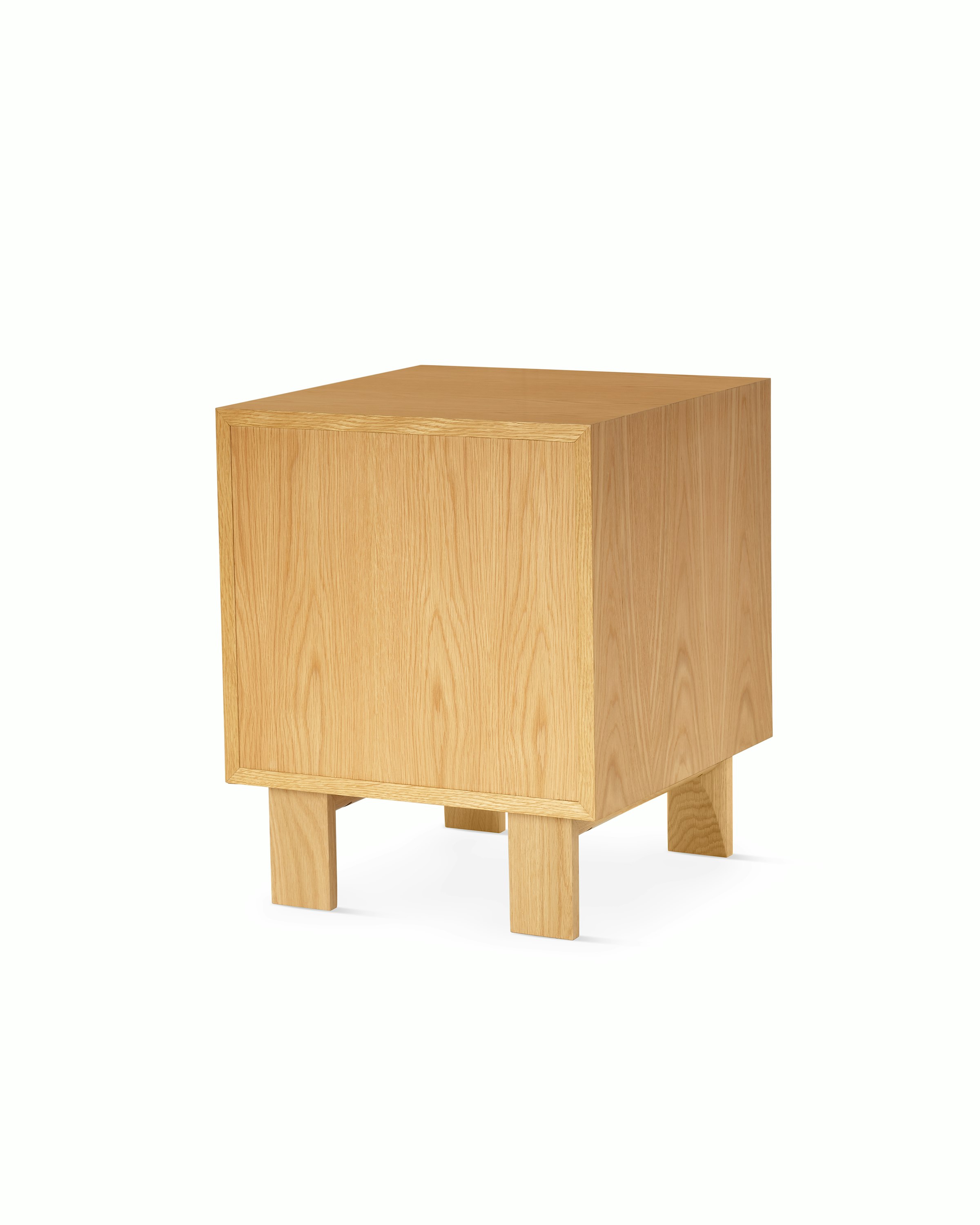 Nelson Basic Cabinet Series Bedside Table with one drawer, aluminum pull, open shelf, standard square legs, in natural oak.