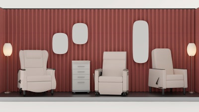 Healthcare seating from Herman Miller, including Nemschoff recliners and a Gemma recliner, arranged in front of a large red curtain at Healthcare Design Conference & Expo.