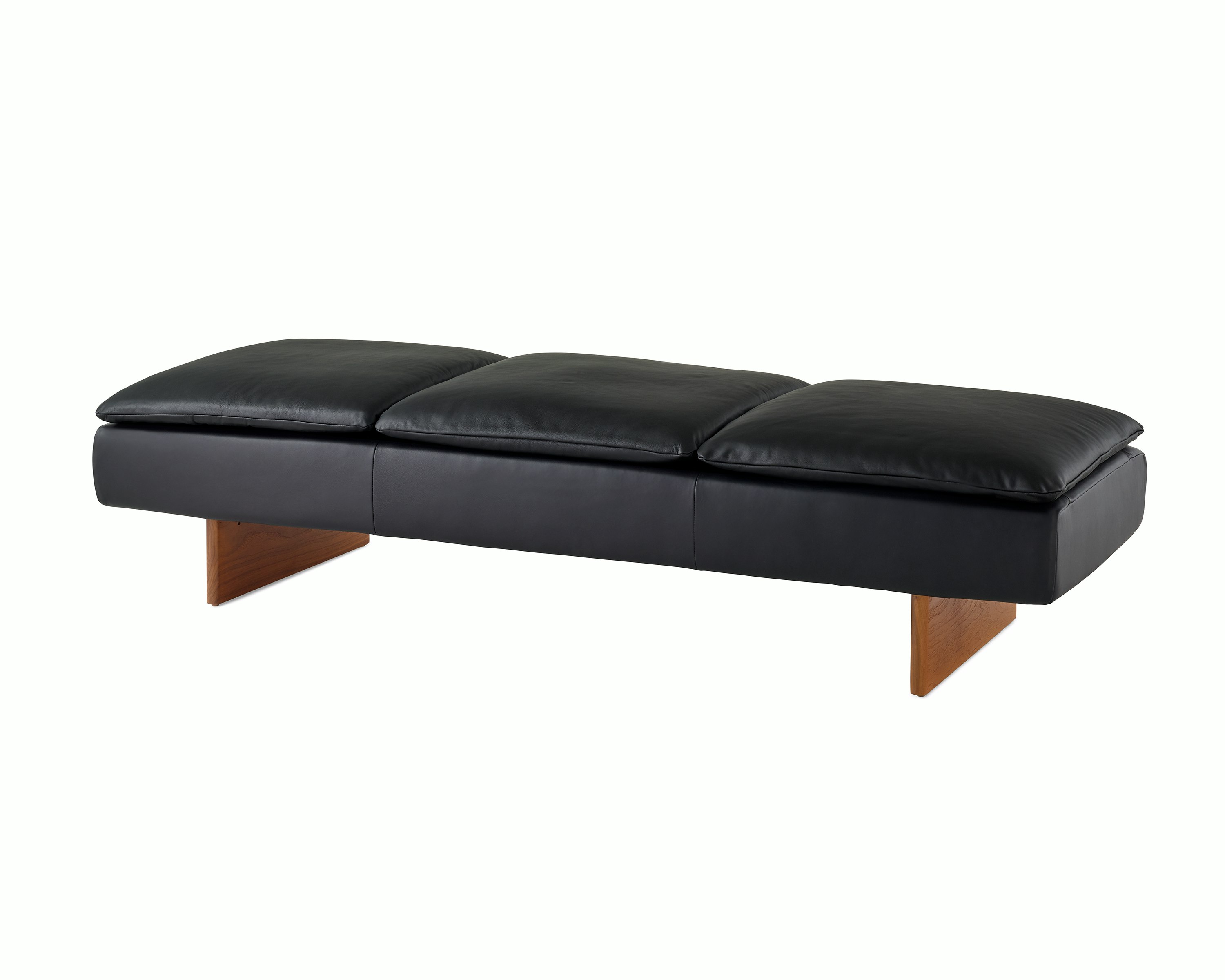 Mantle Three Seater Bench in black leather with a walnut base, viewed at an angle.