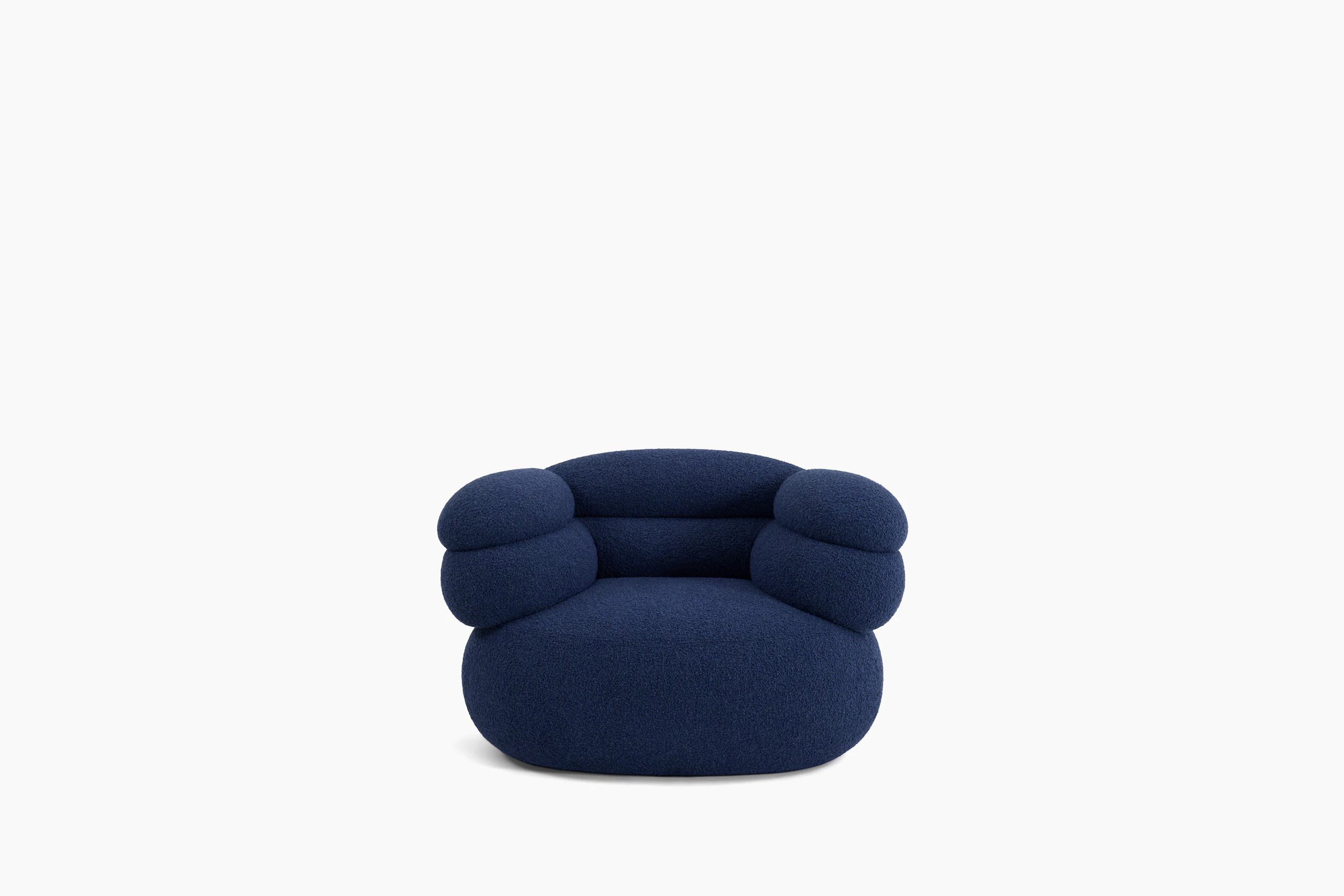 A Biboni Lounge Chair in Solid Sublime, Navy viewed from the front.
