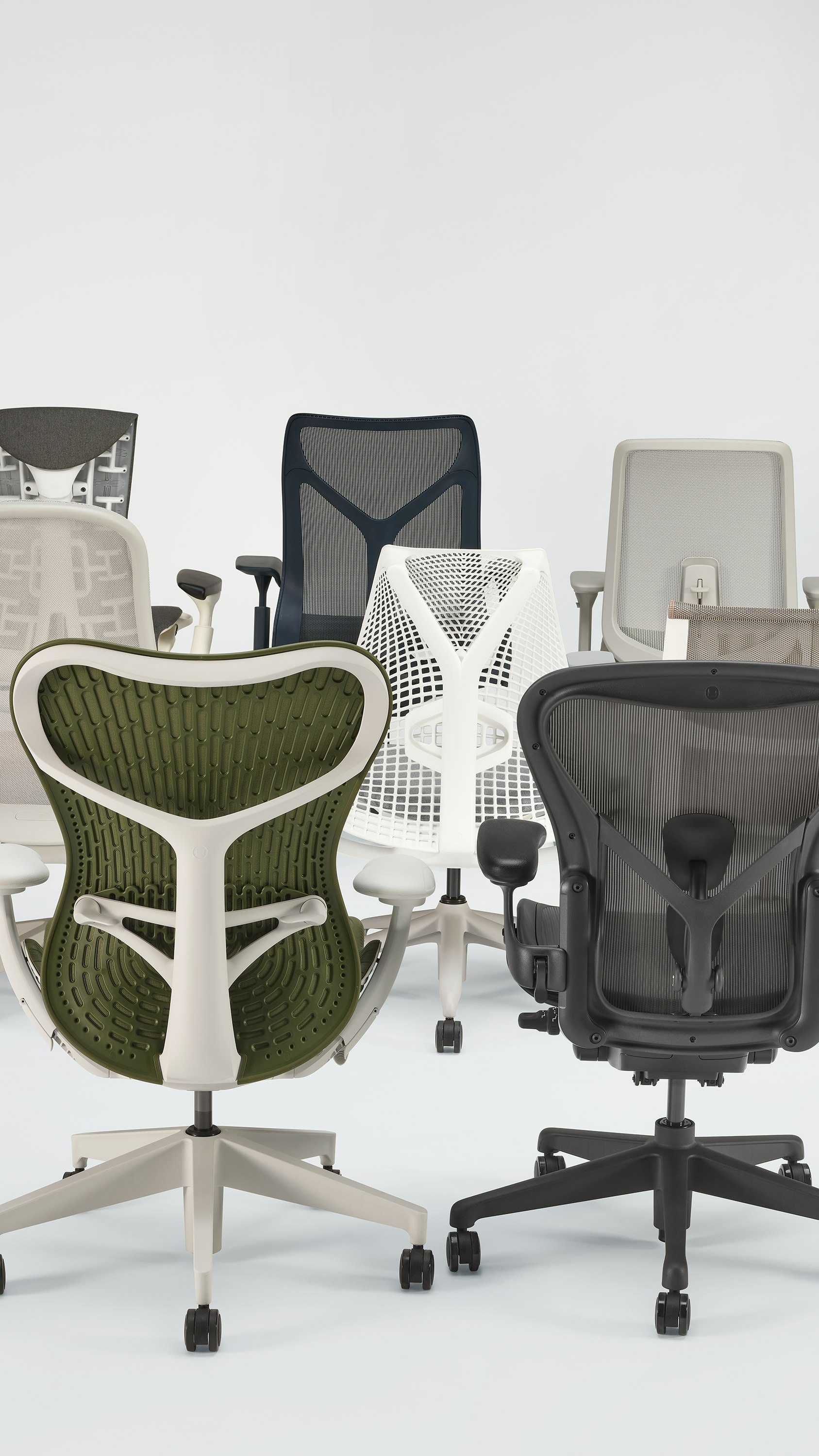 Eight high-performance chairs arranged vertically. Includes Aeron, Embody, Cosm, Mirra 2, Sayl, Verus, Lino, and Setu.