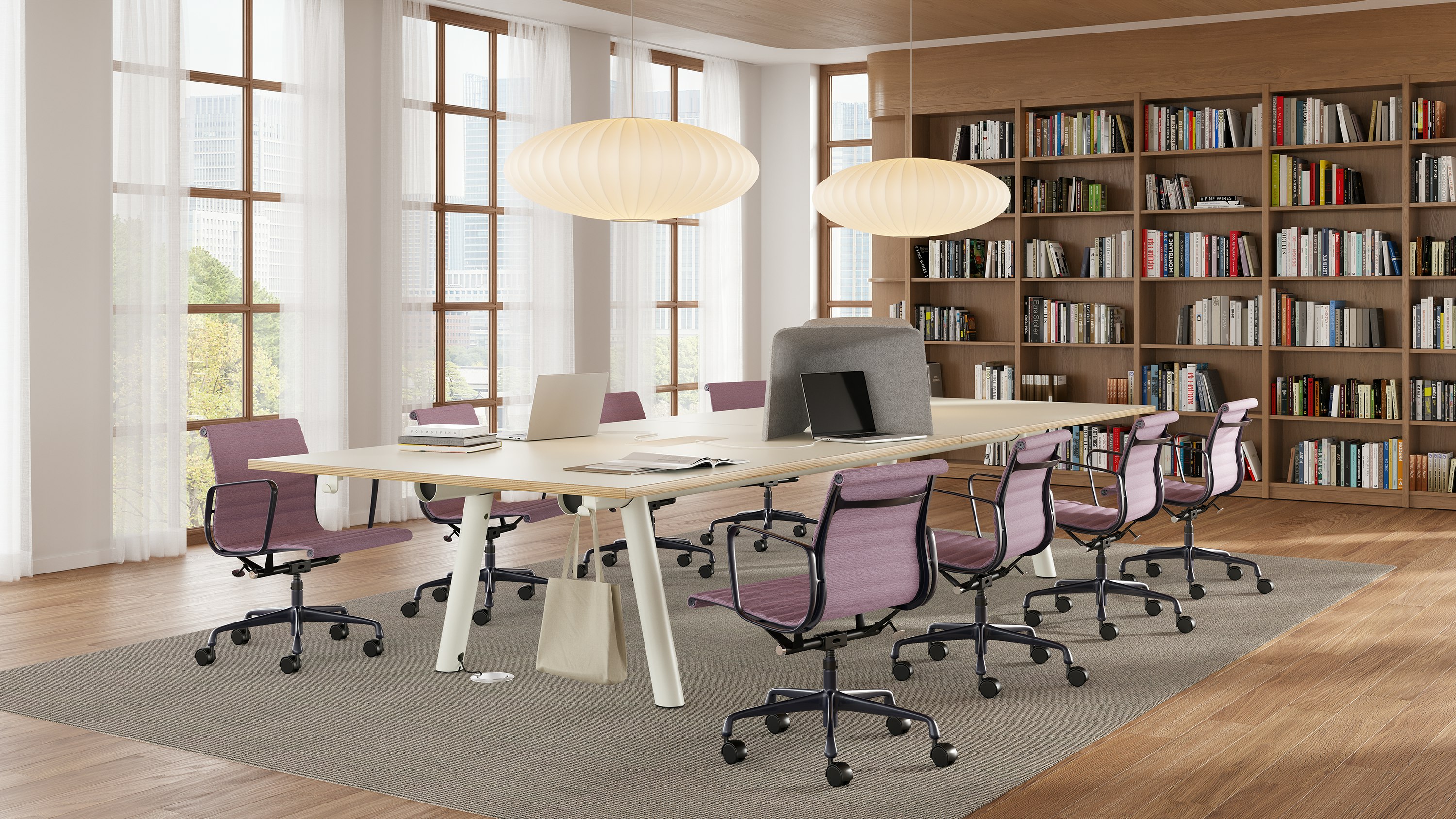 Rectangular Boa Table, seated height, oak top, white base, in a library setting with Eames Aluminum Group chairs.