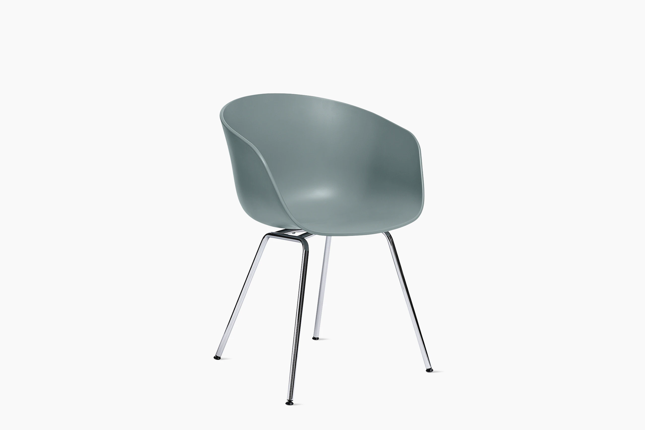 A front angle view of the AAC 26 About a Chair Armchair with a metal base.