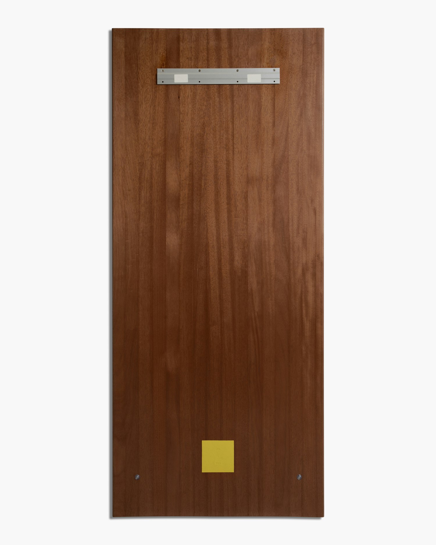 A Stitch Mirror in Walnut viewed from behind.