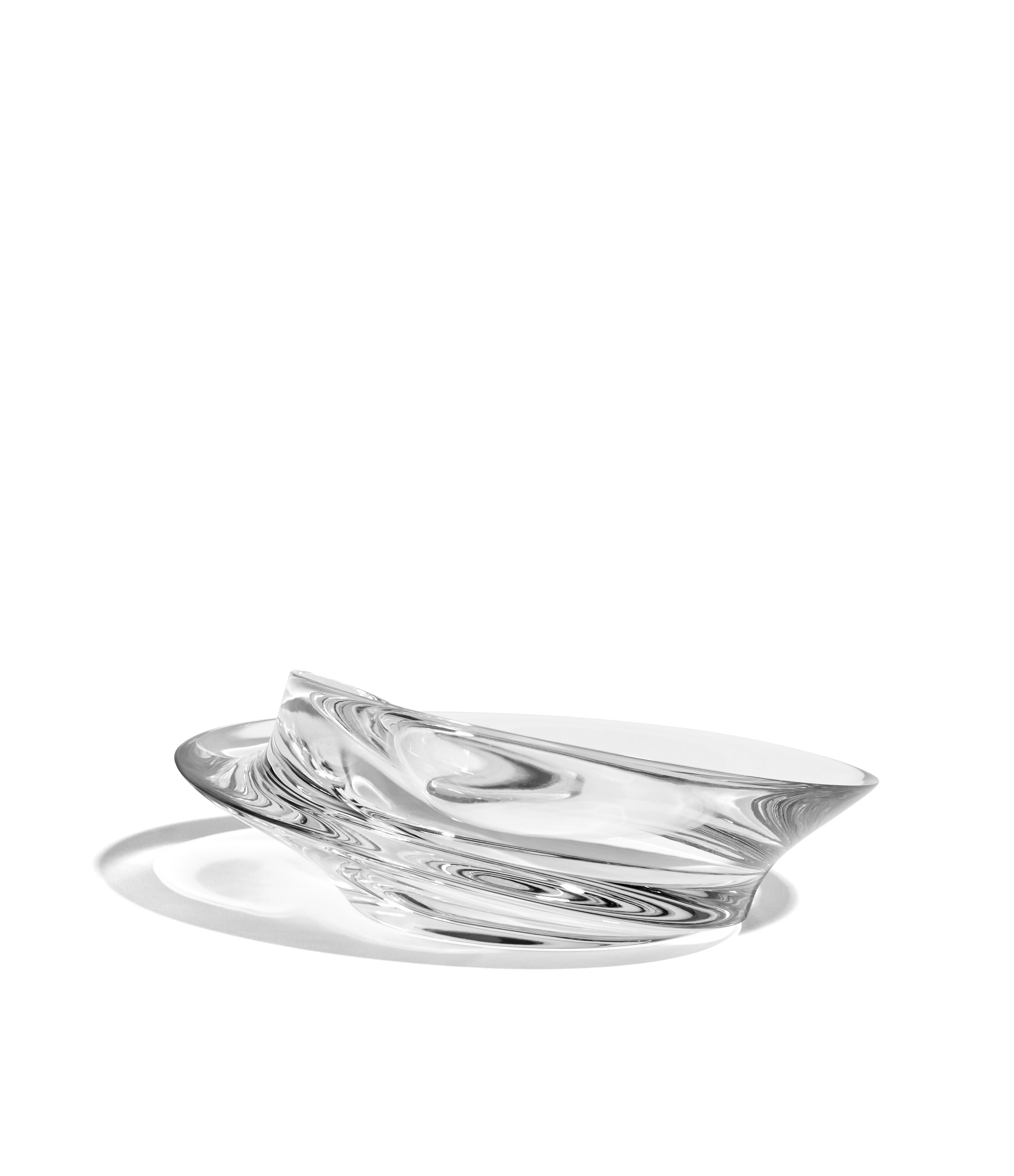 A Swirl Bowl in Small, Glass viewed from the side.