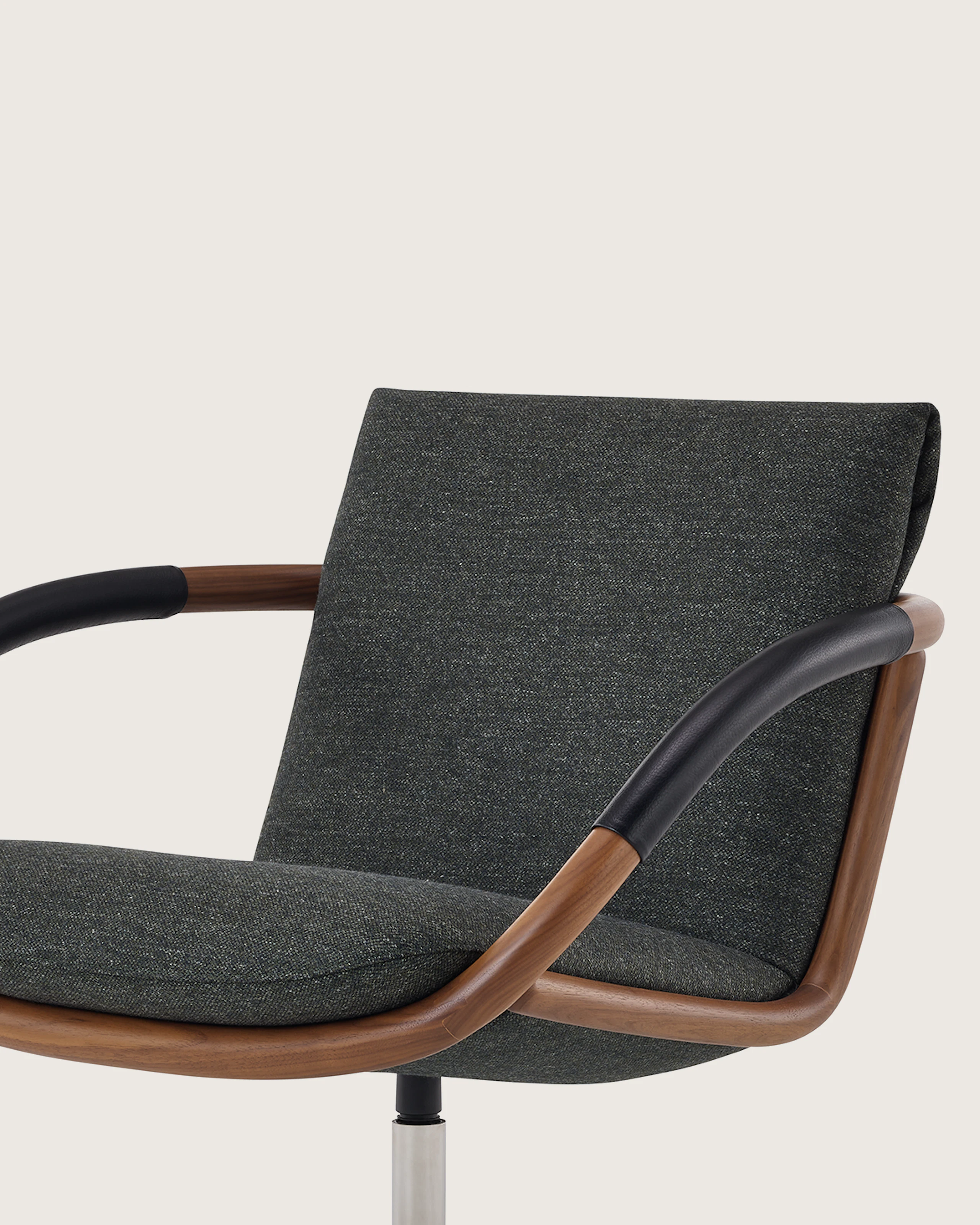 Full Loop Lounge Chair in Walnut with 4 star base.
