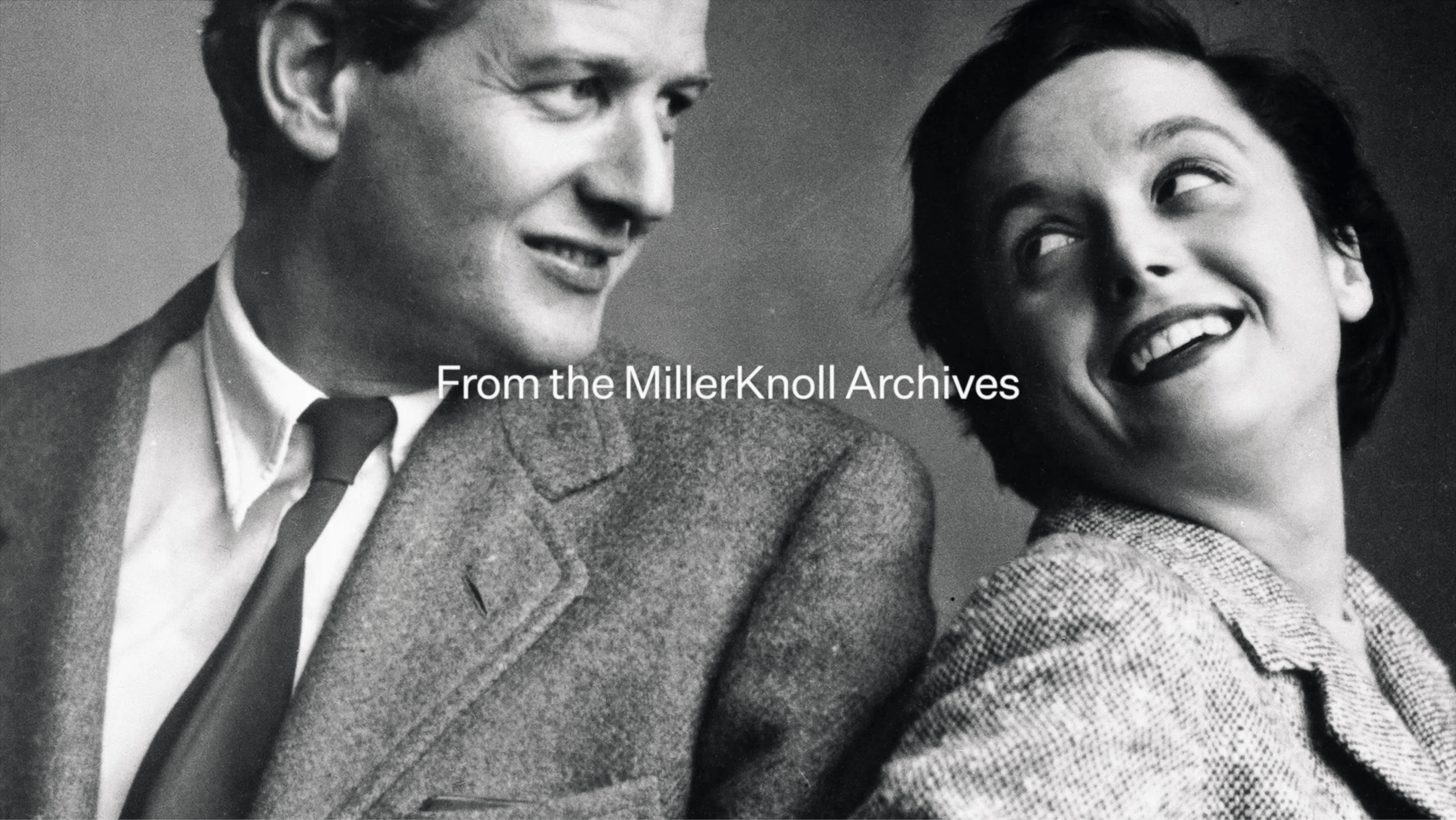 White text reading "From the MillerKnoll Archives" overlayed on an image of a man and woman smiling at each other.