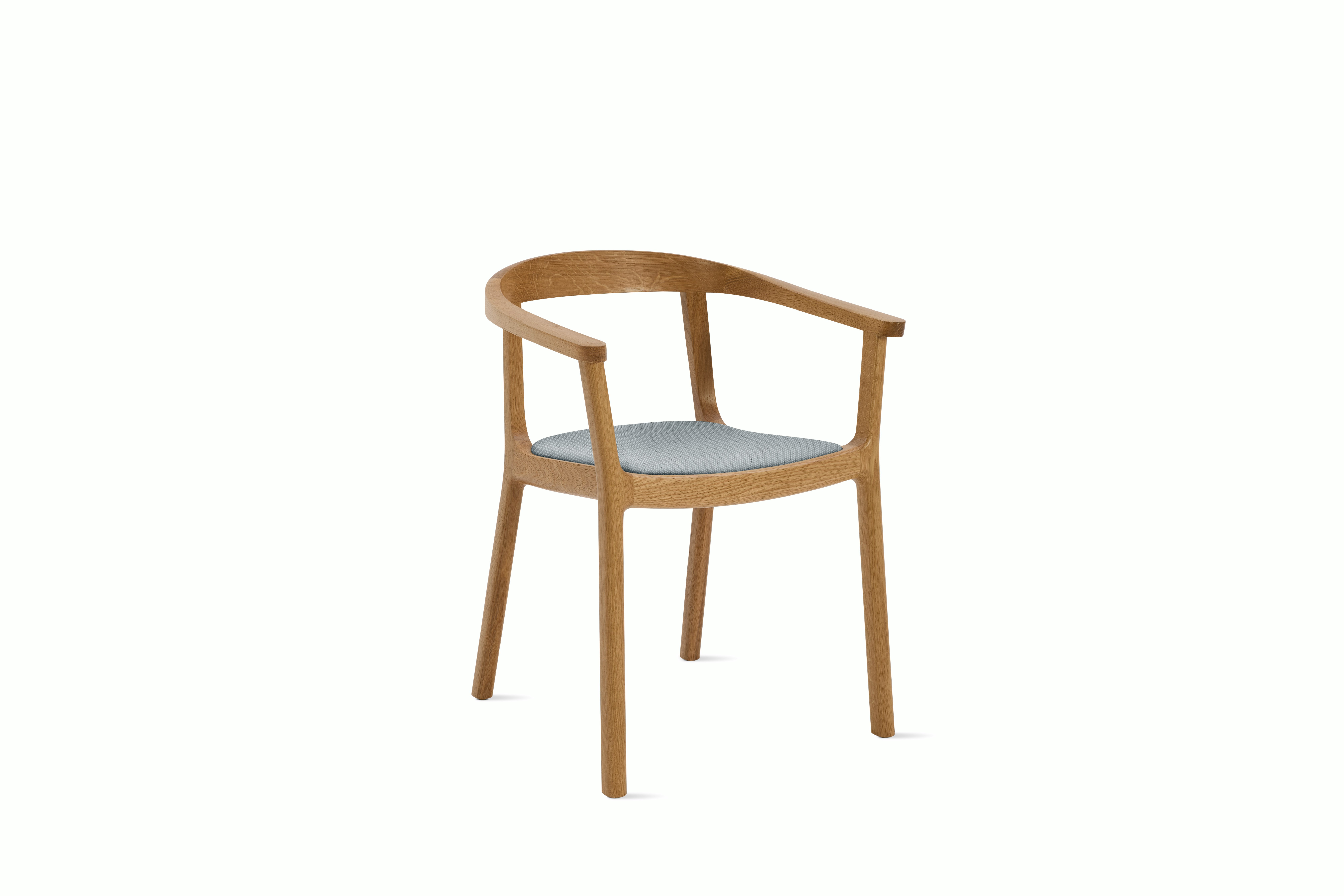 A Lijn Armchair in Intaglio Oak viewed from an angle.