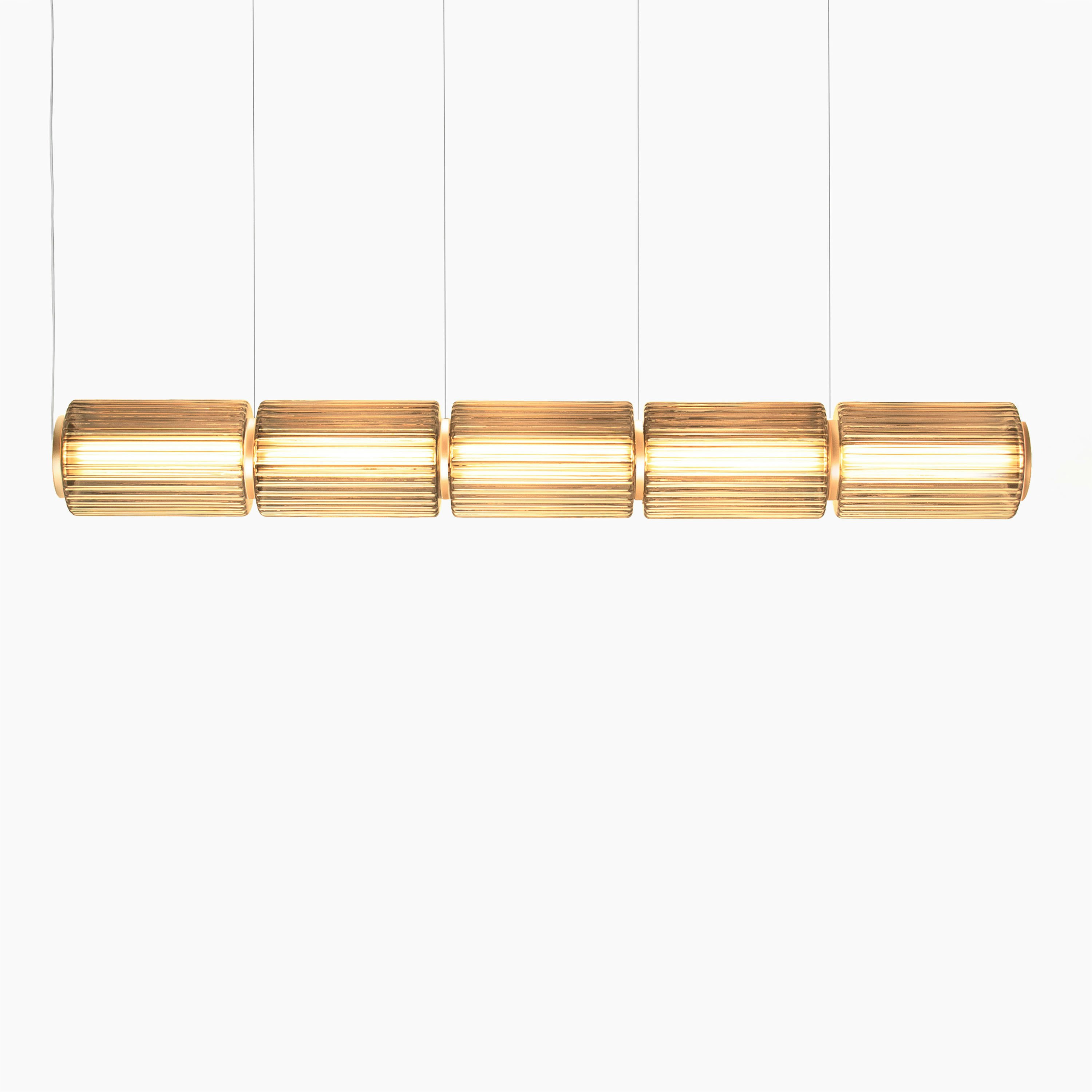 A Column 175 Horizontal Pendant in Amber viewed from the front.