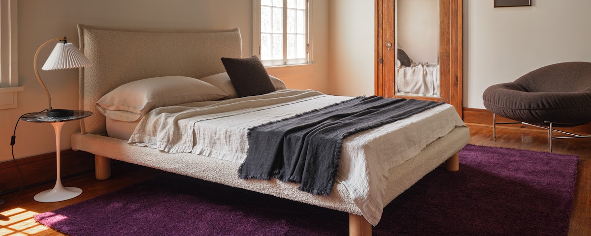Chique Rug on a wooden floor in a bedroom setting