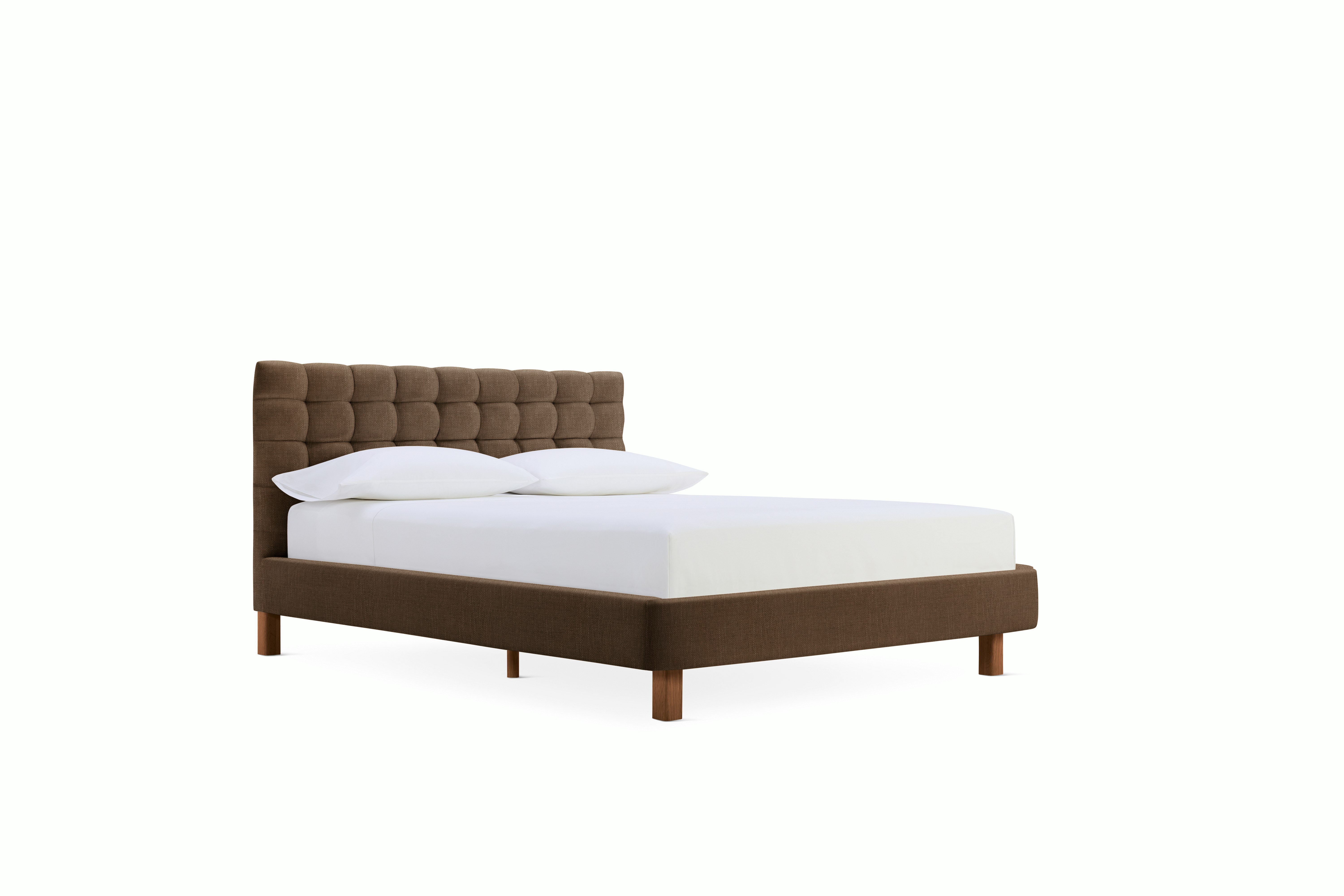 A Madeleine Bed in  Walnut viewed from the front.