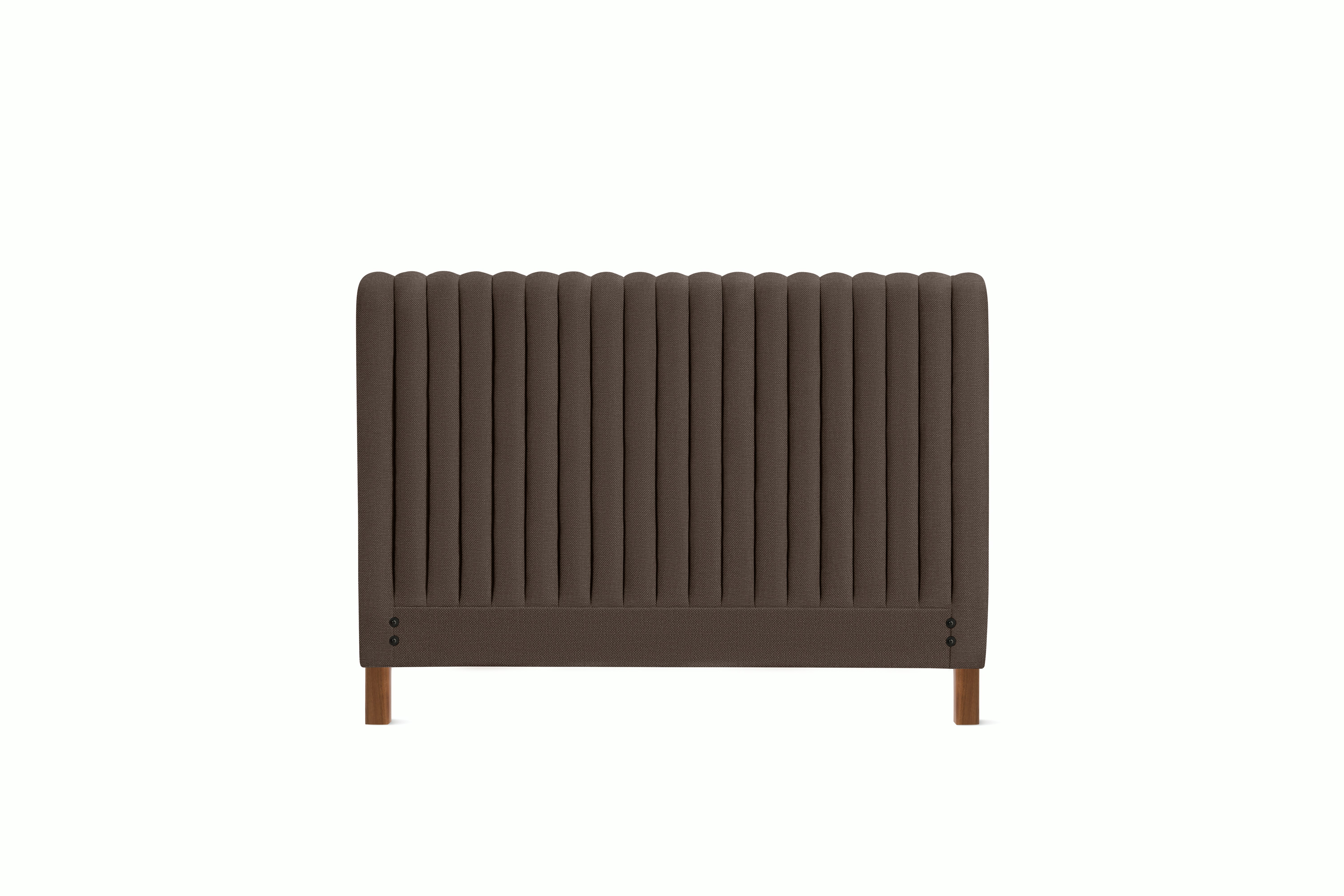 A Charlotte Headboard in Hollow viewed from an angle.