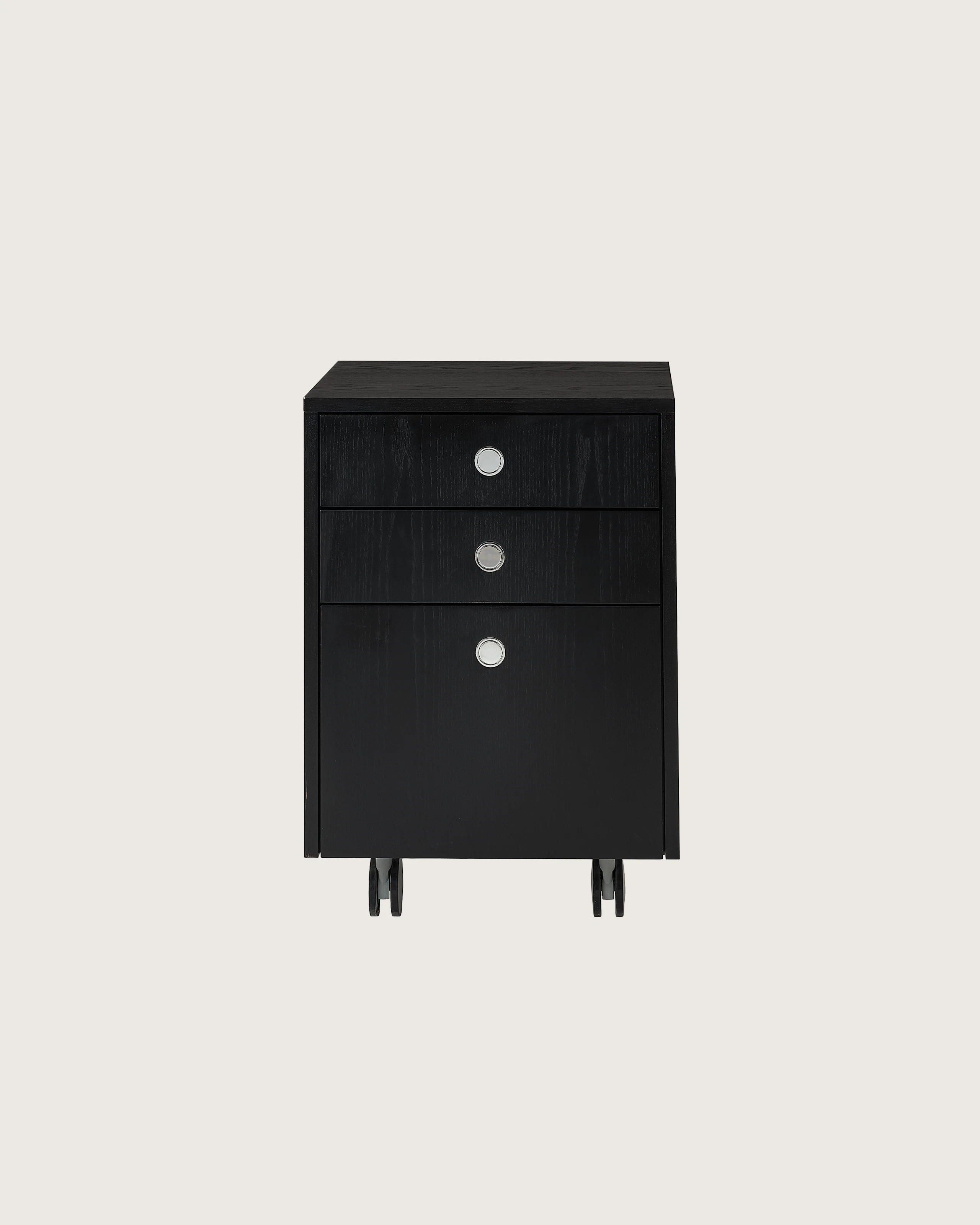 Sled Base Pedestal designed by Ward Bennett in Ebonized Ash with casters, shown front-facing on a white sweep.