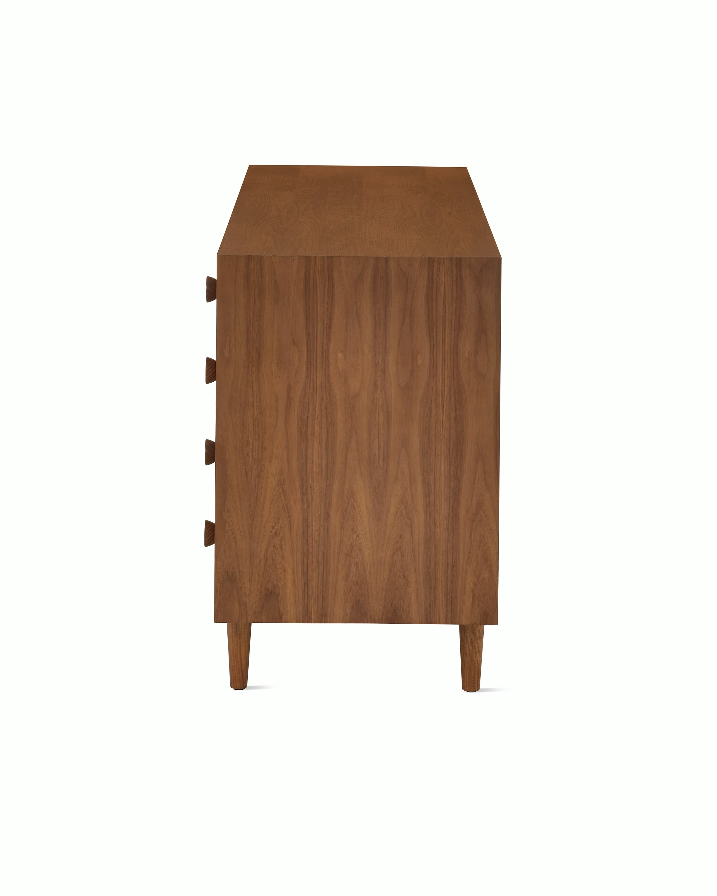 Nelson Basic Cabinet Series Credenza in walnut with two doors, four drawers, taper legs, and cupcake pulls.