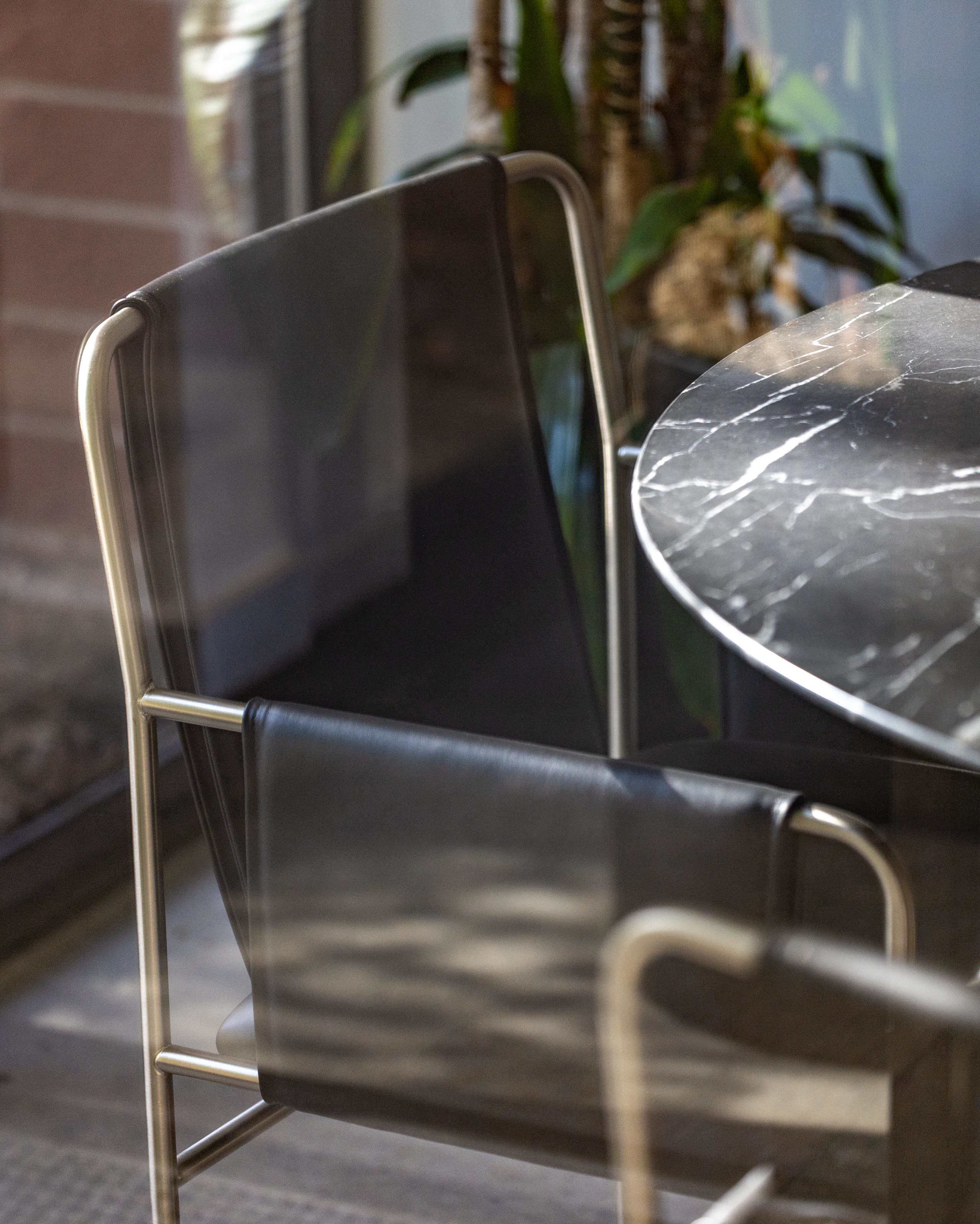 Image of an office space through a window from the Geiger Atlanta Manufacturing Facility.