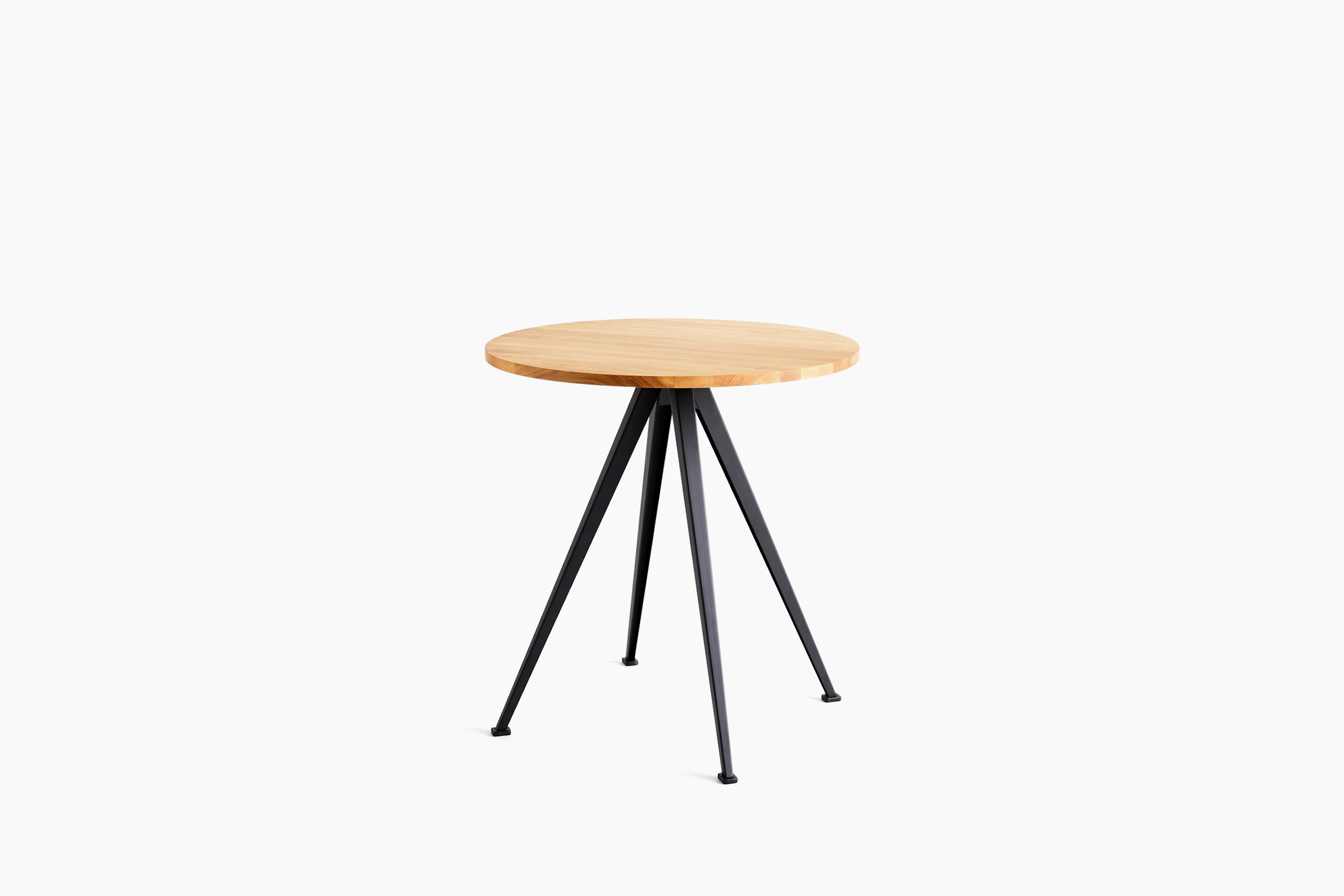 A front view of the Pyramid Cafe Table- round with Oak top and black frame.