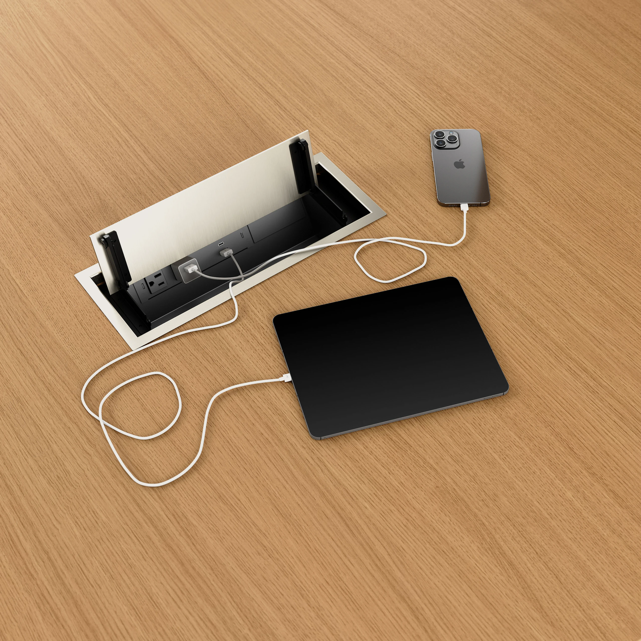Detail shot of open tabletop power access on JD Media Table and Wall in Natural Rift Cut Oak.