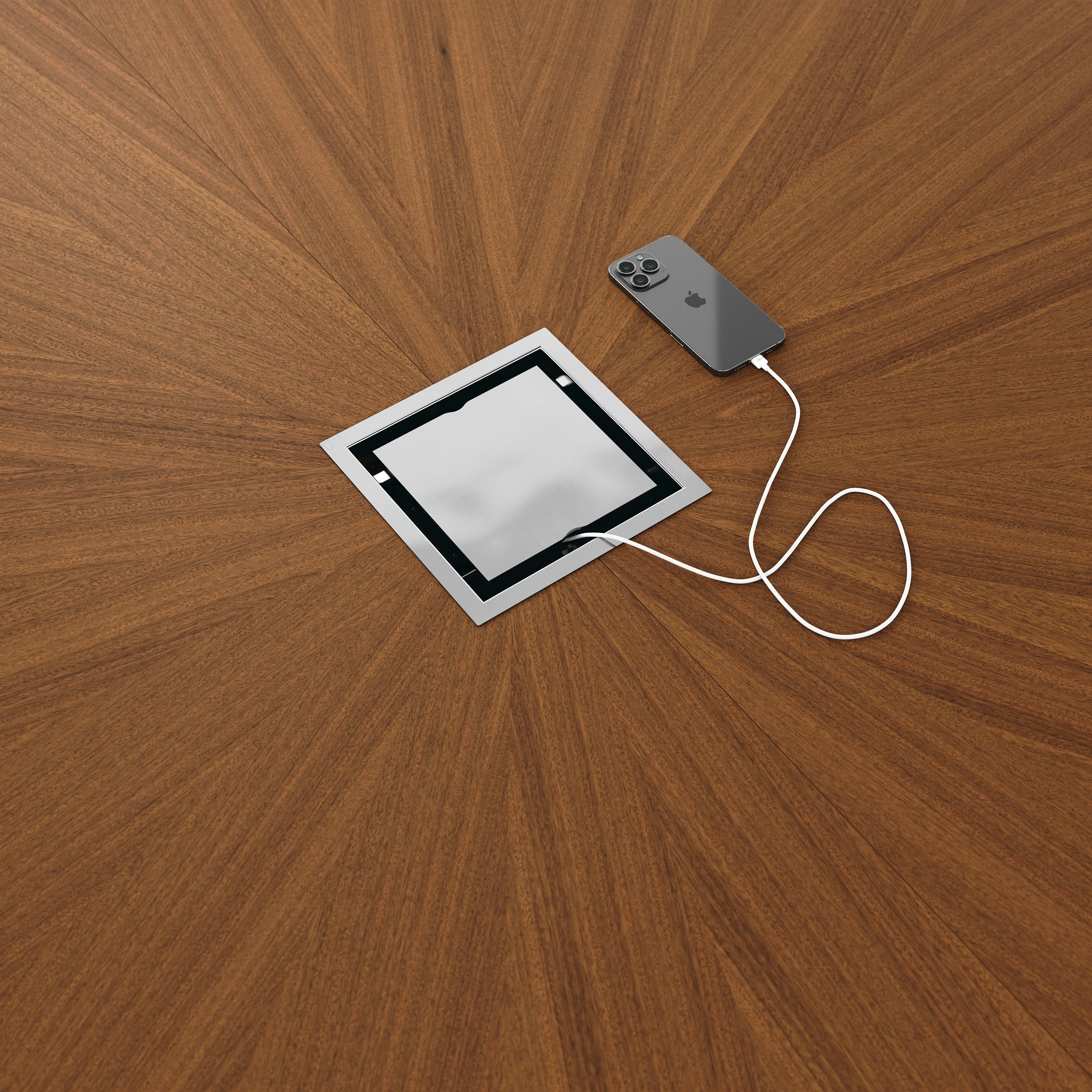 Detail shot of closed tabletop power access on a Highline Fifty Meeting Table in Natural Quarter Cut Walnut with Polished Chrome details.