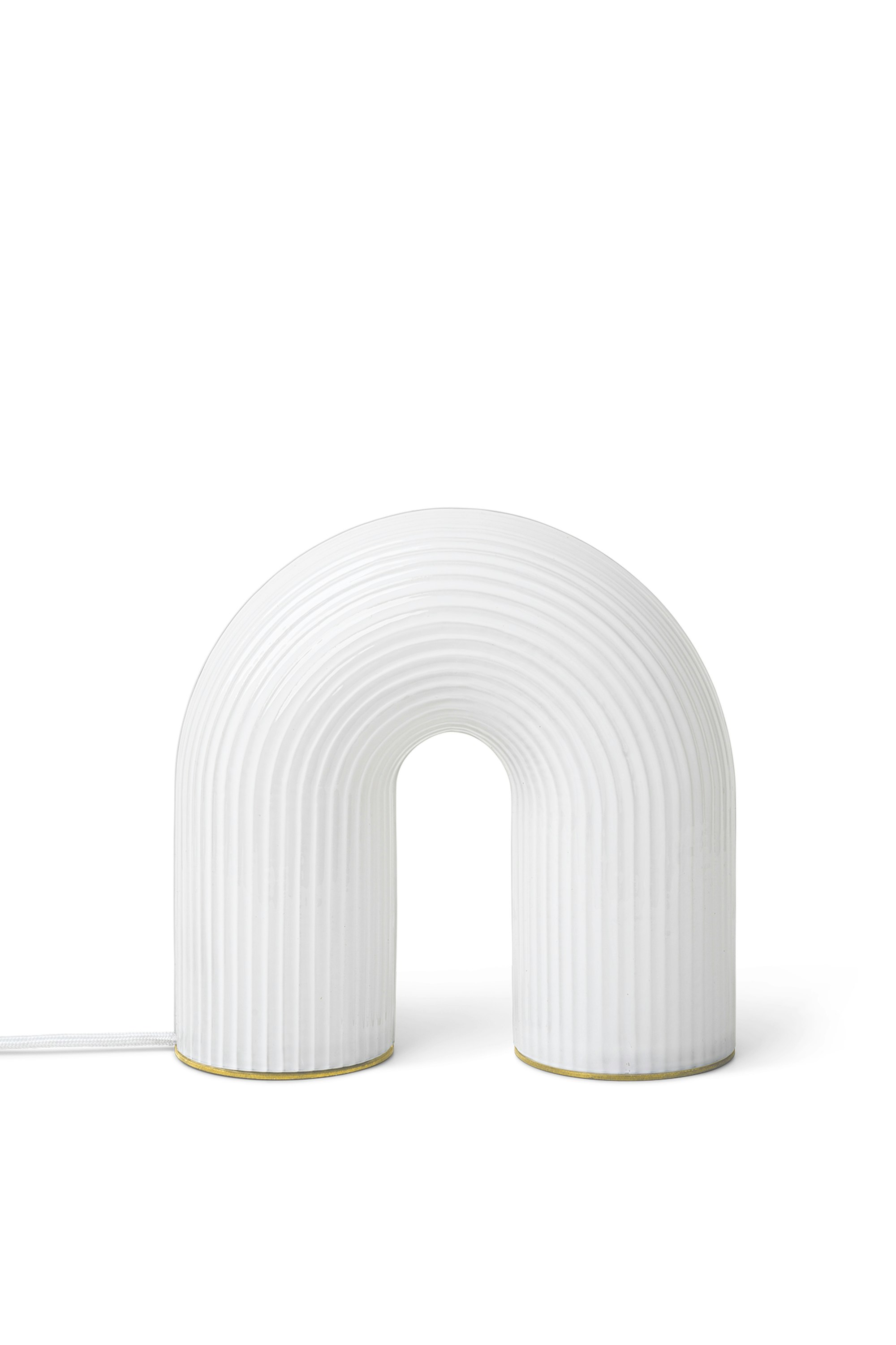 A Vuelta Table Lamp in white Viewed from the front.