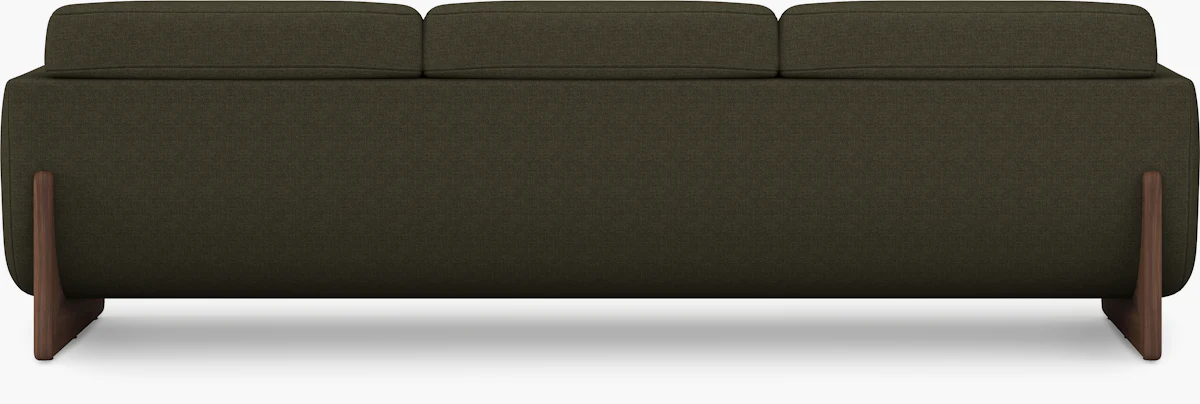 Back view of large sofa showing three back cushions and dark upholstery