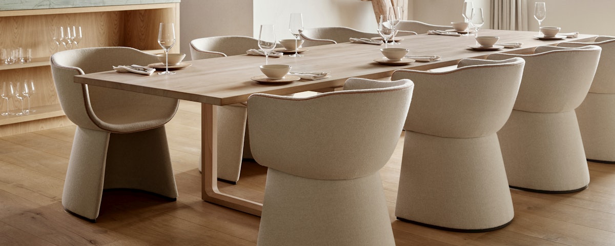 Eight Monolit Dining Chairs around a dining table