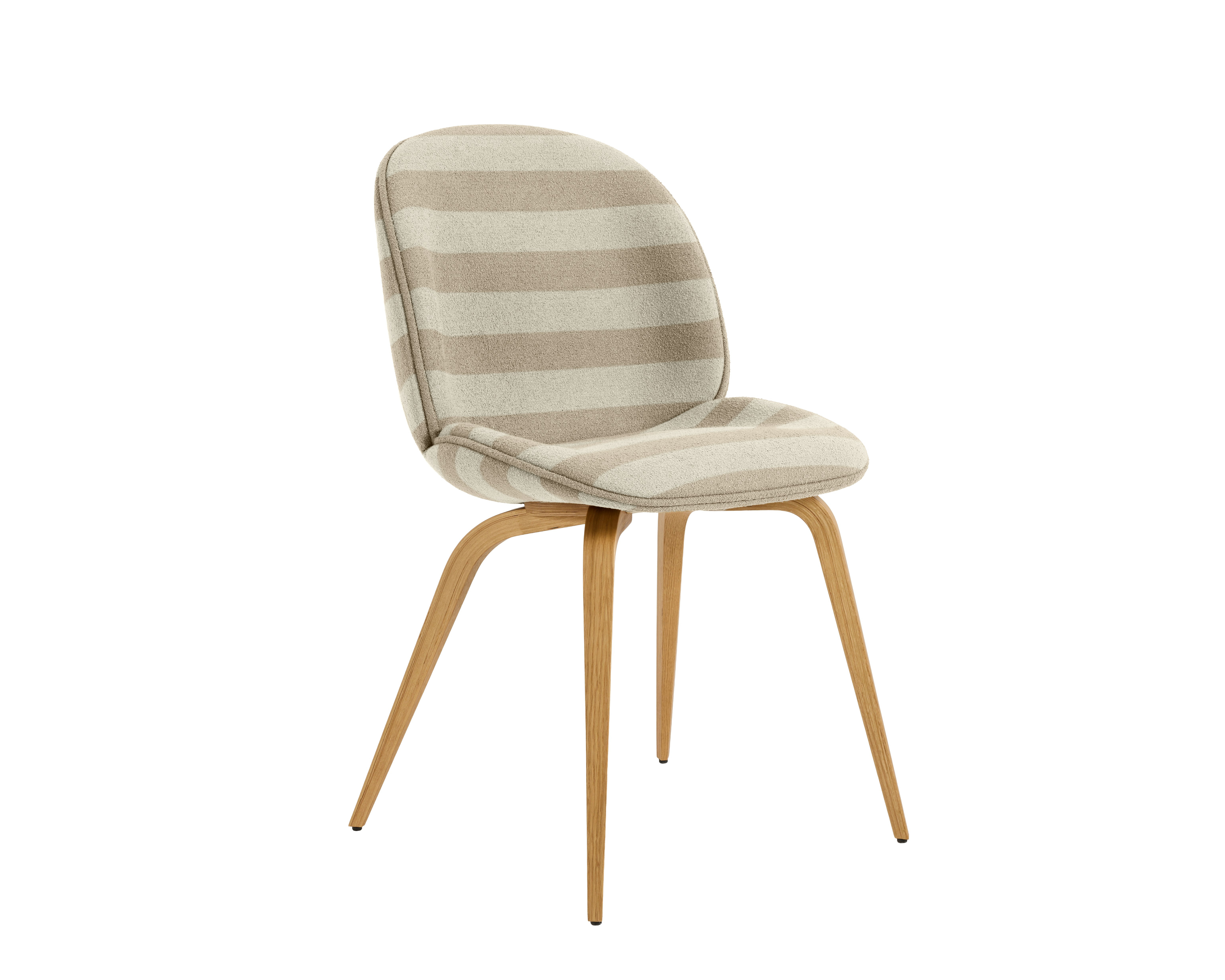 A Beetle Side Chair in natural tan, oak viewed from an angle.