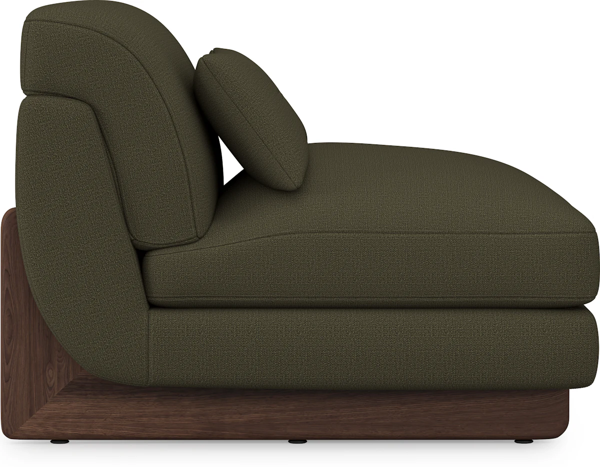 Front view of a dark olive green armchair with wooden legs.