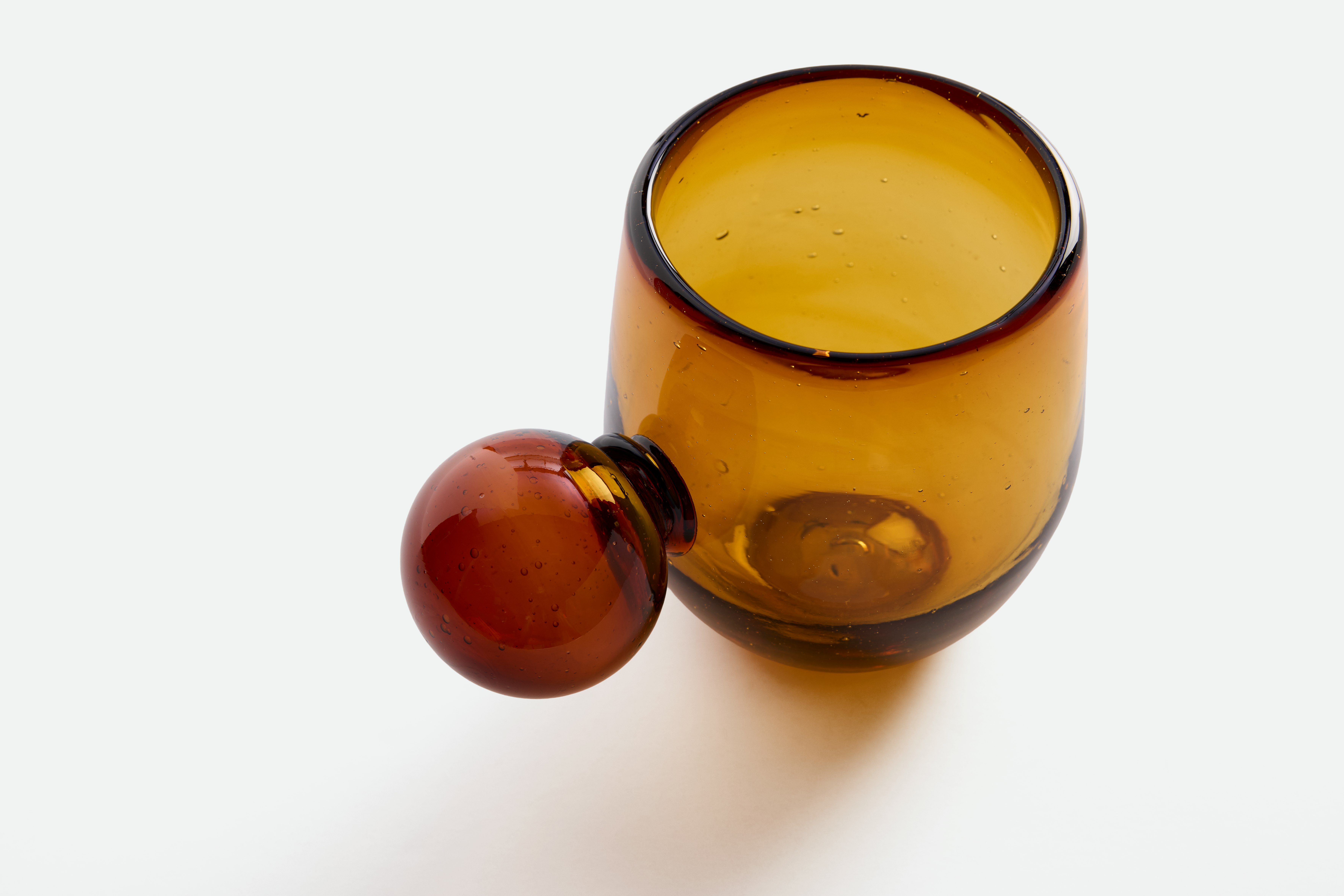 A detailed look at a Roo Glasses, Set of 4 in Amber.