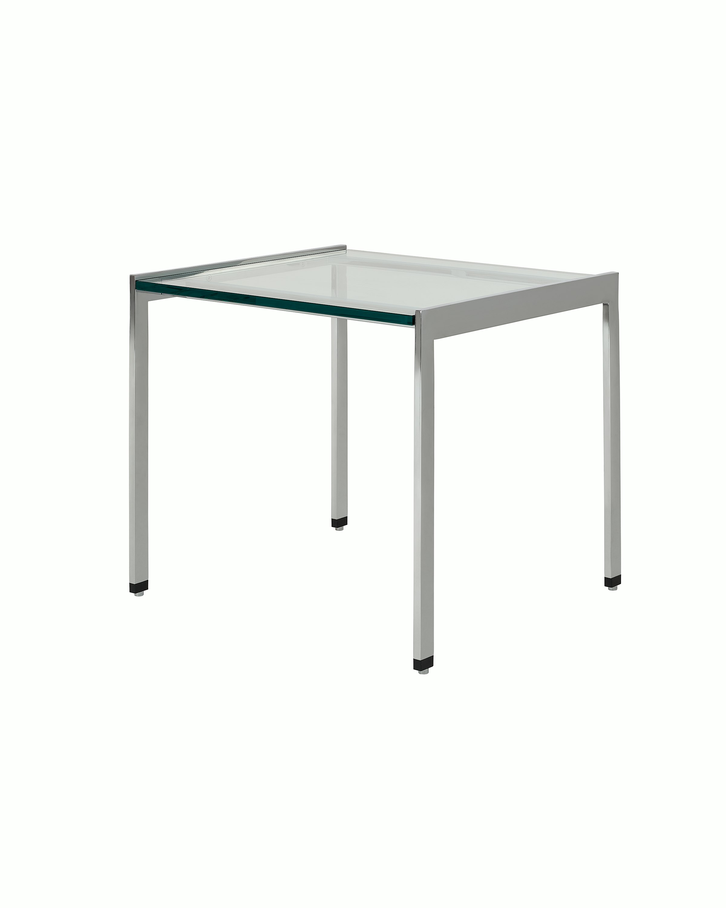 H Frame Side Table designed by Ward Bennett with a polished chrome base and a clear glass top, shown at an angle on a white sweep.