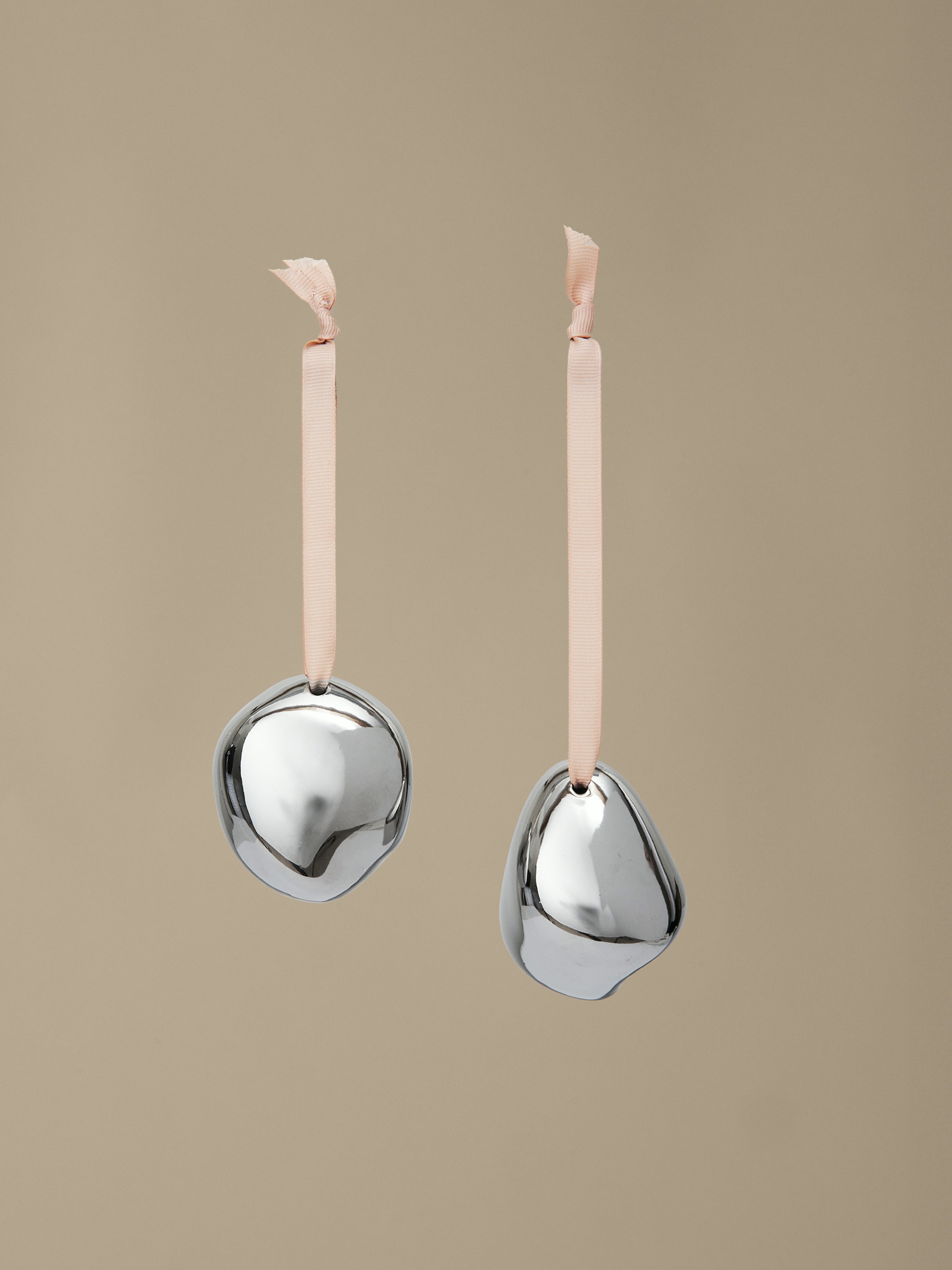 A Bellure Baubles, Set of 2 in Silver viewed from the front.