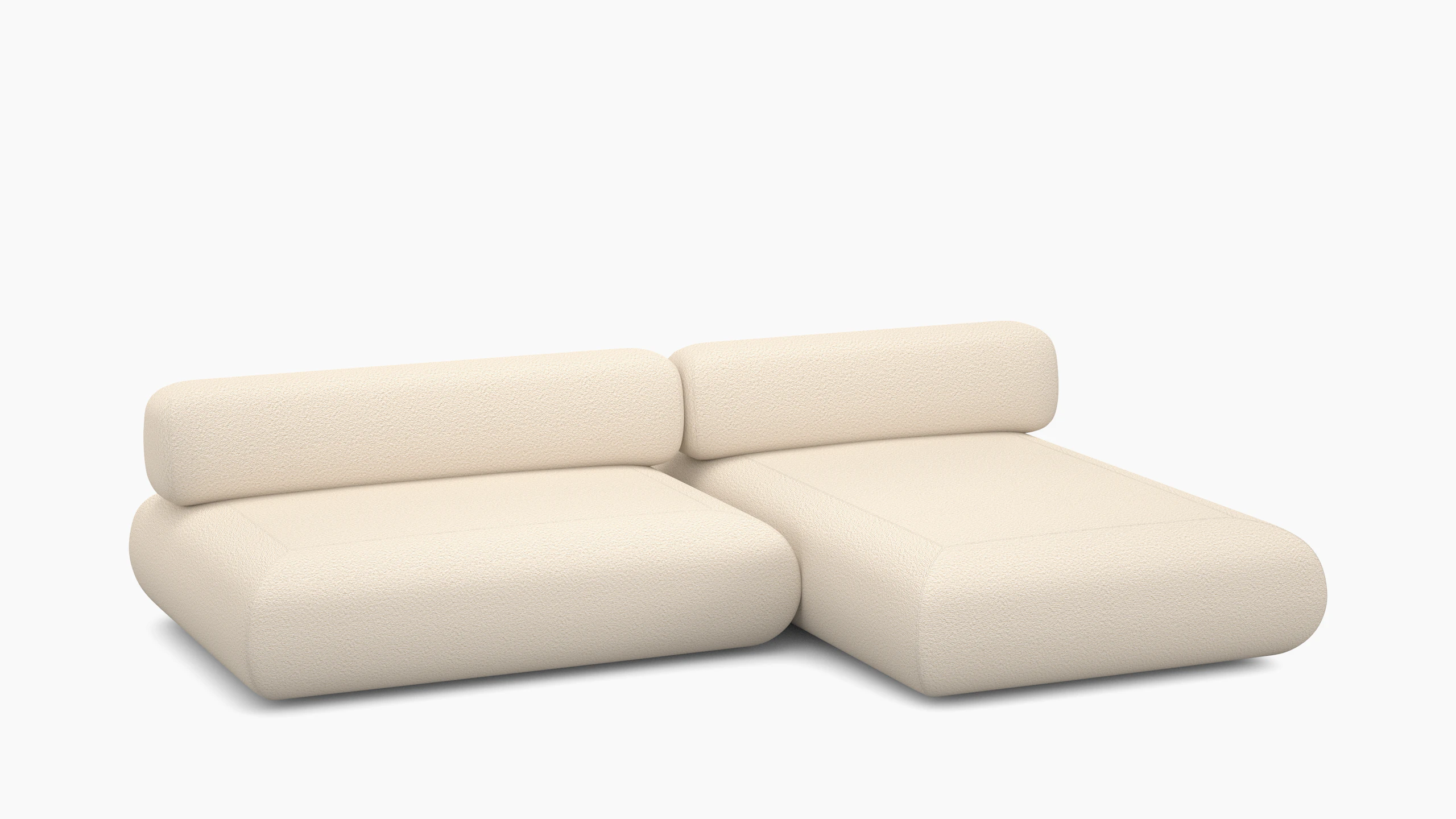 A Sval Open End with Chaise Sectional in Cream viewed from an angle.