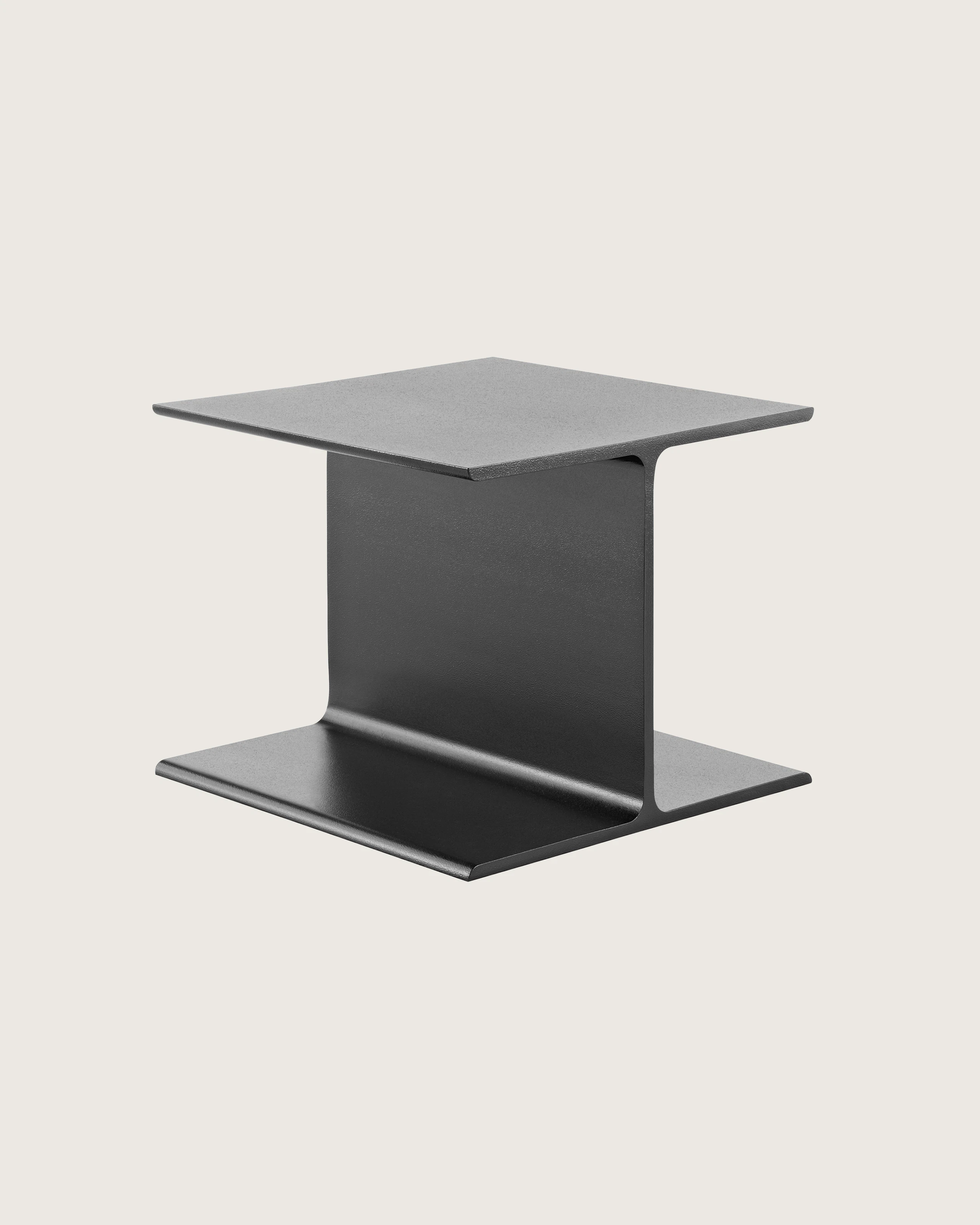 Angled view of a black I Beam side table with no attached surface.