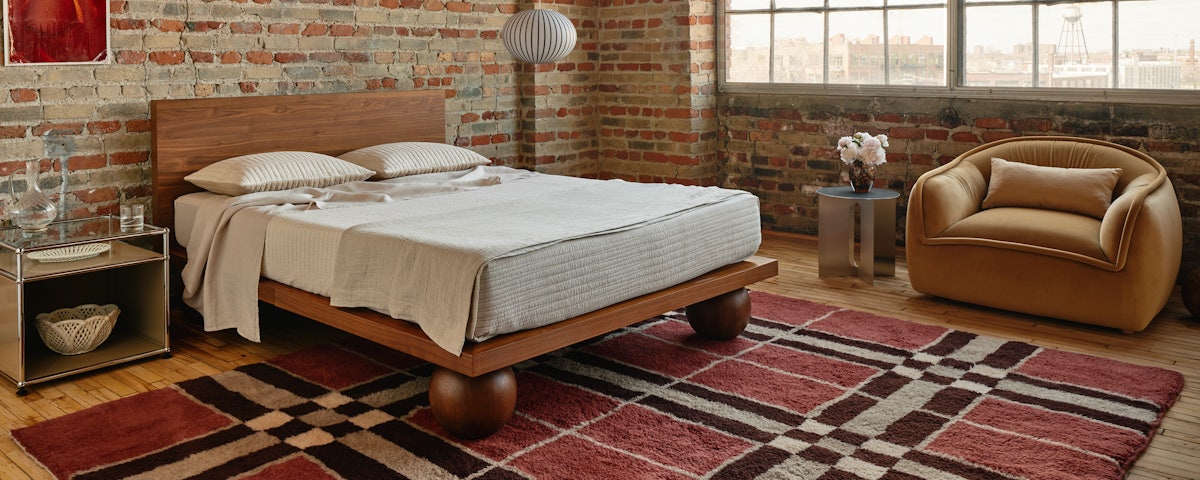 Everest Rug under a Yoko Bed in a bedroom setting