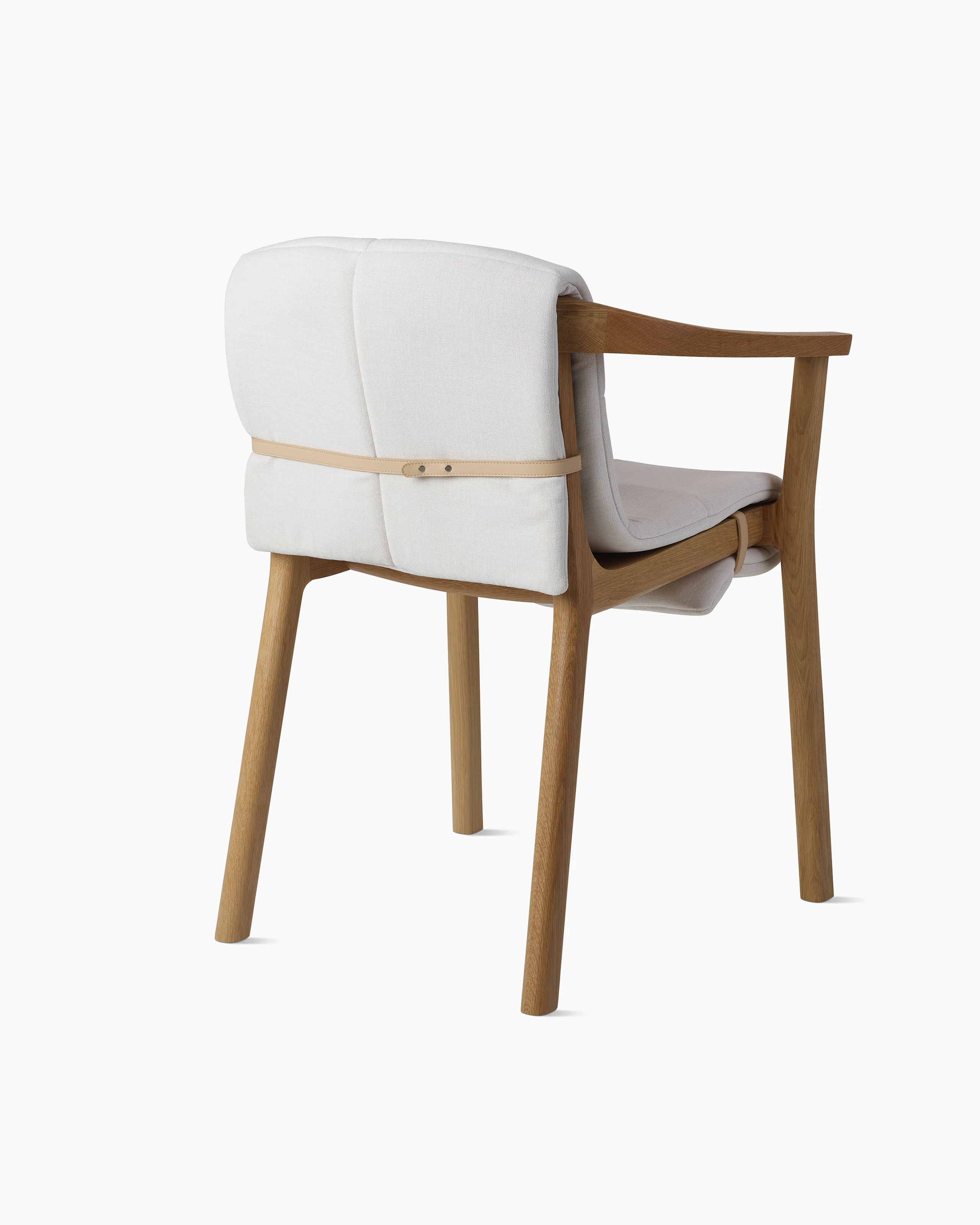 Lijn Armchair by Carole Baijings for Geiger in Natural Oak frame with quilted wrap in Vionette White Sand Mix, angled back view on a white sweep.