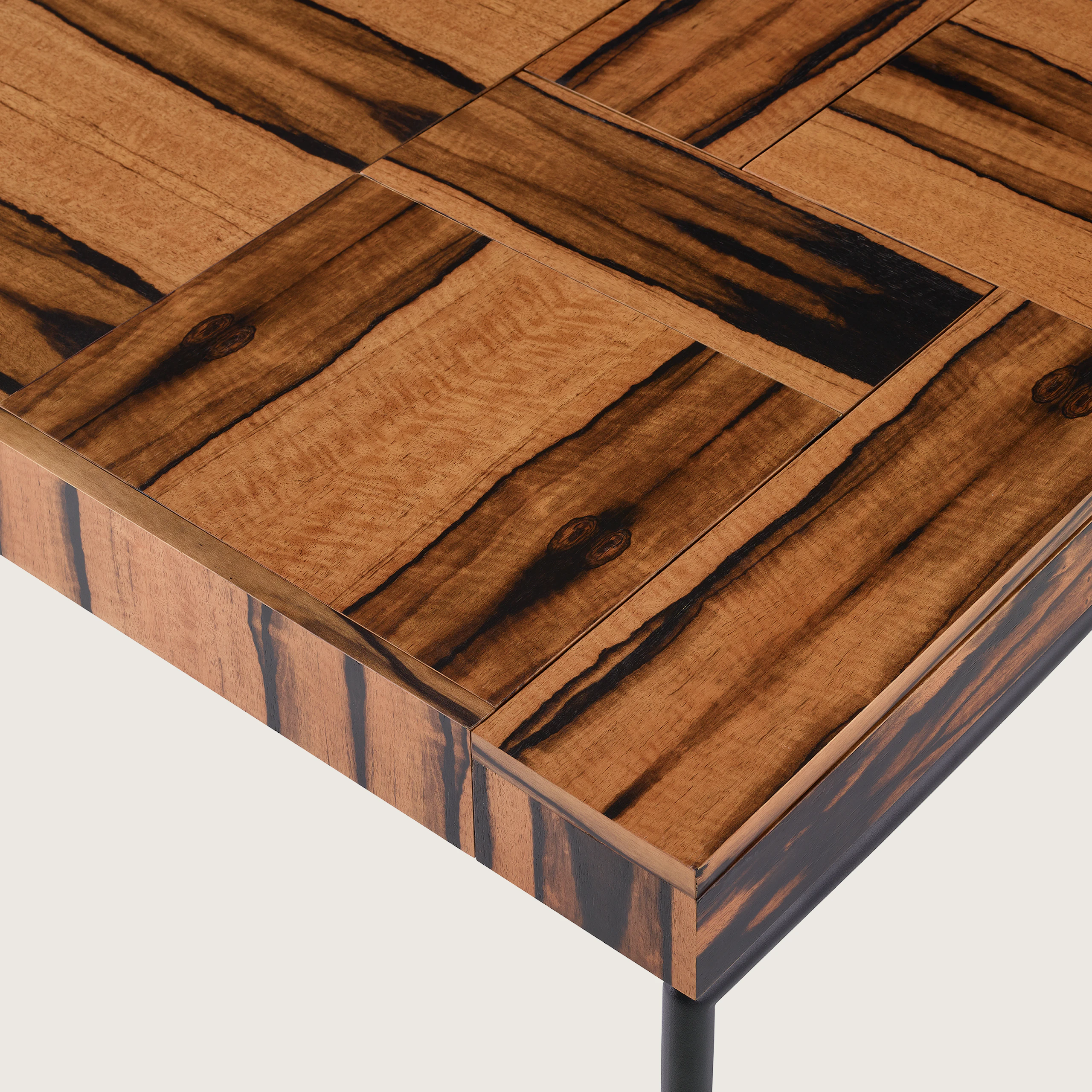 A close up of the Domino Desk showing the wood grain in different directions for the storage compartments.