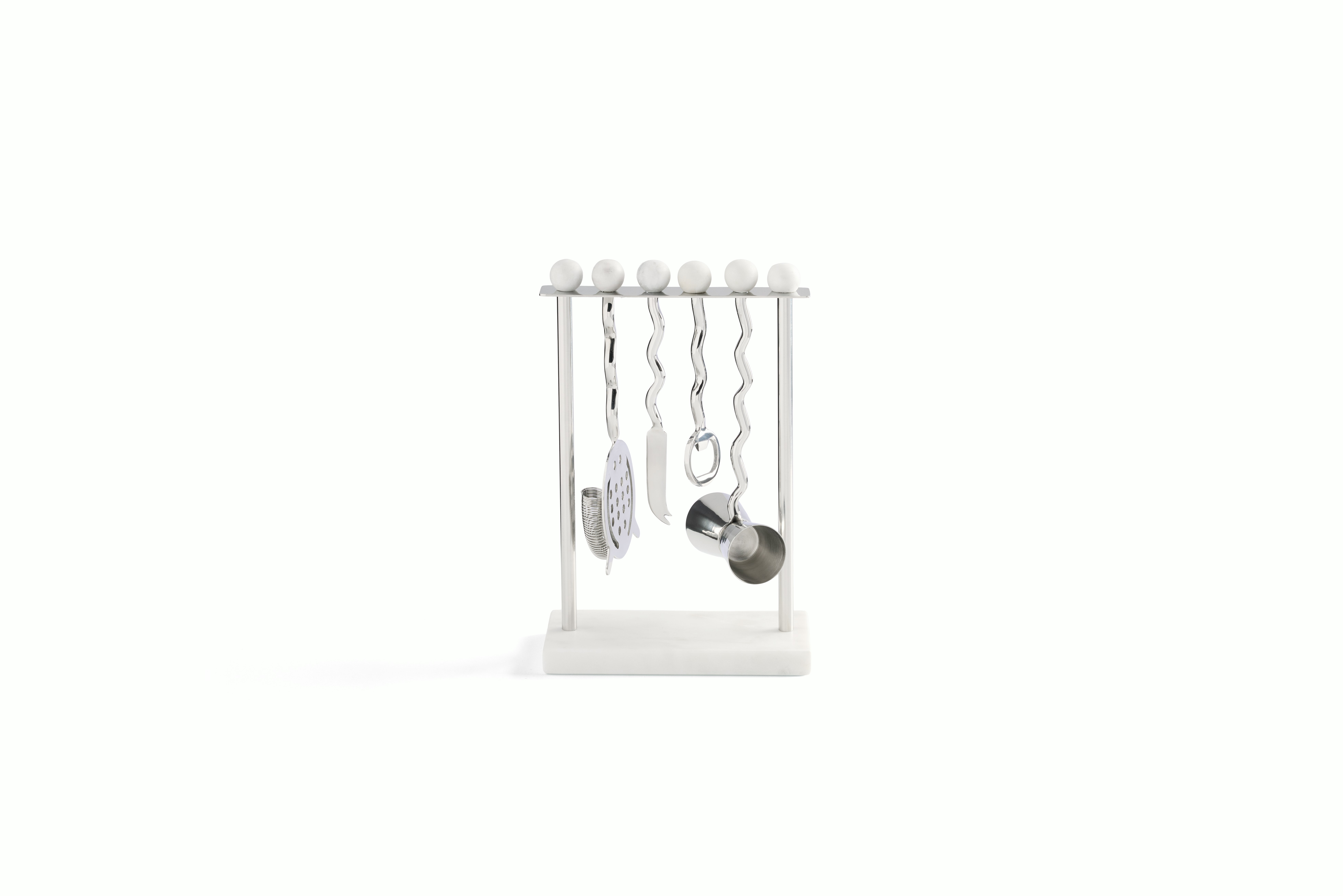 A June Bar Set in Stainless Steel / Marble viewed from behind.
