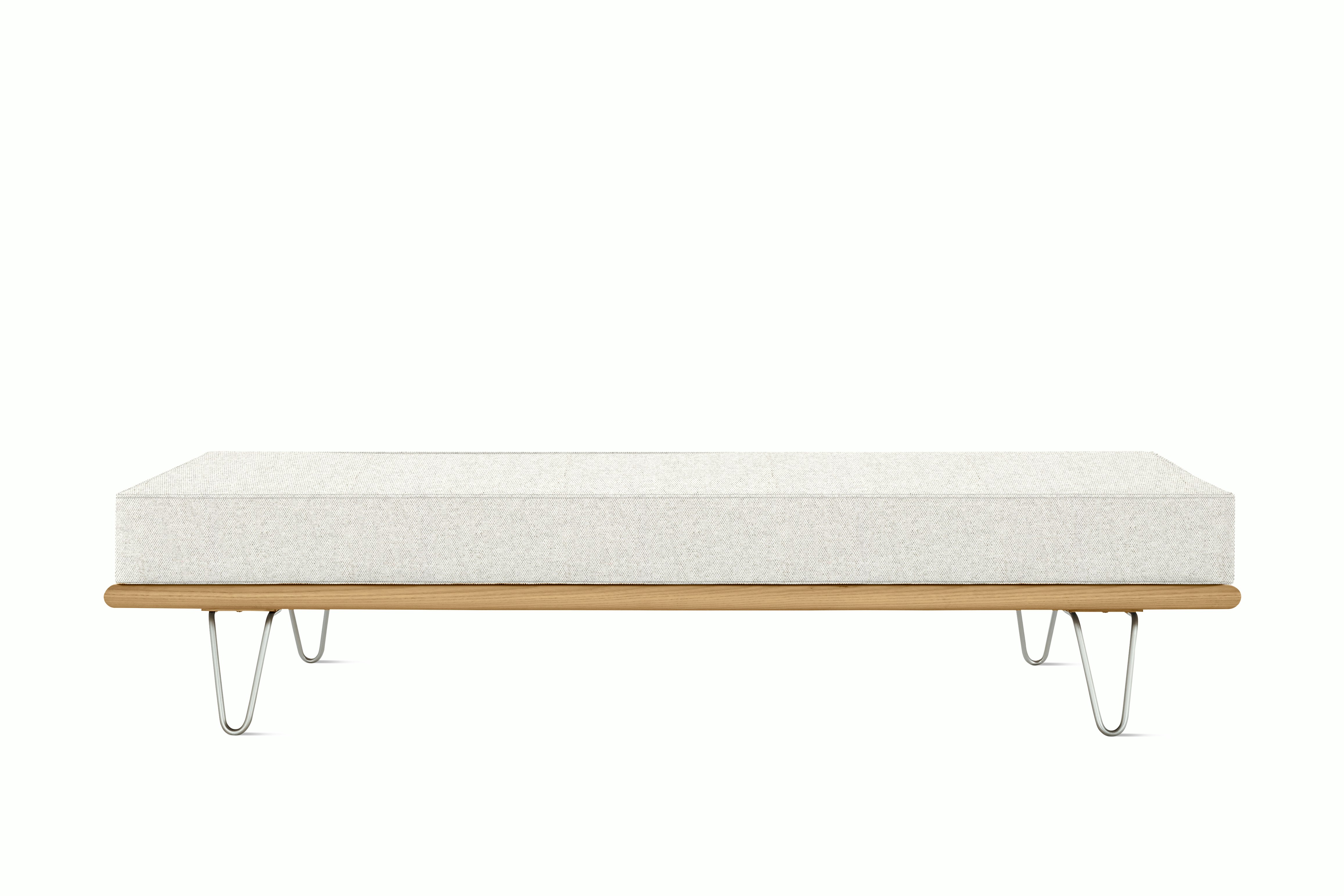 A Nelson Daybed in oak blanched viewed from the front.