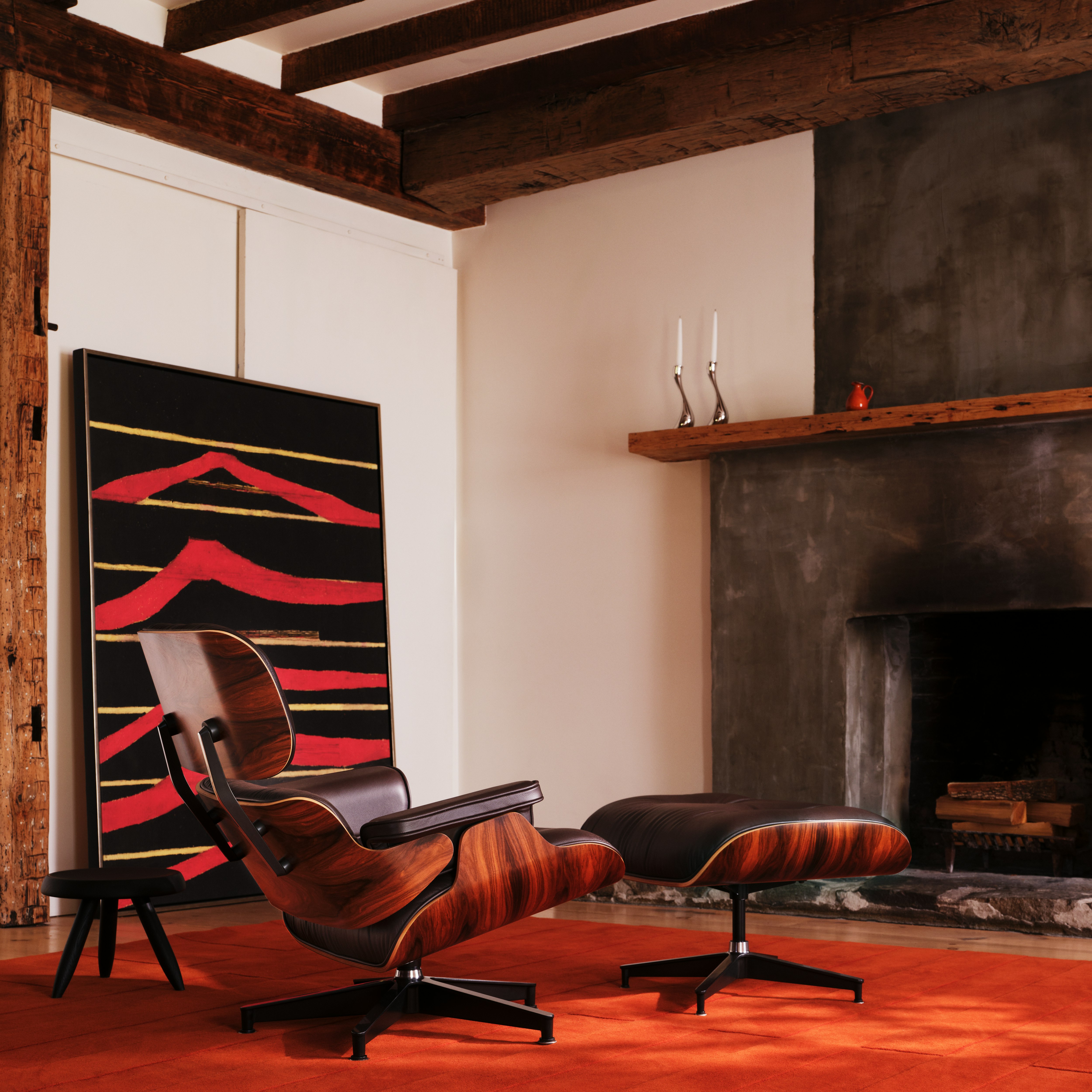 Eames Lounge and Ottoman in brown leather and palisander