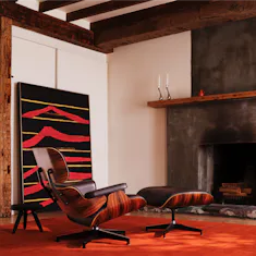 Eames Lounge and Ottoman in brown leather and palisander