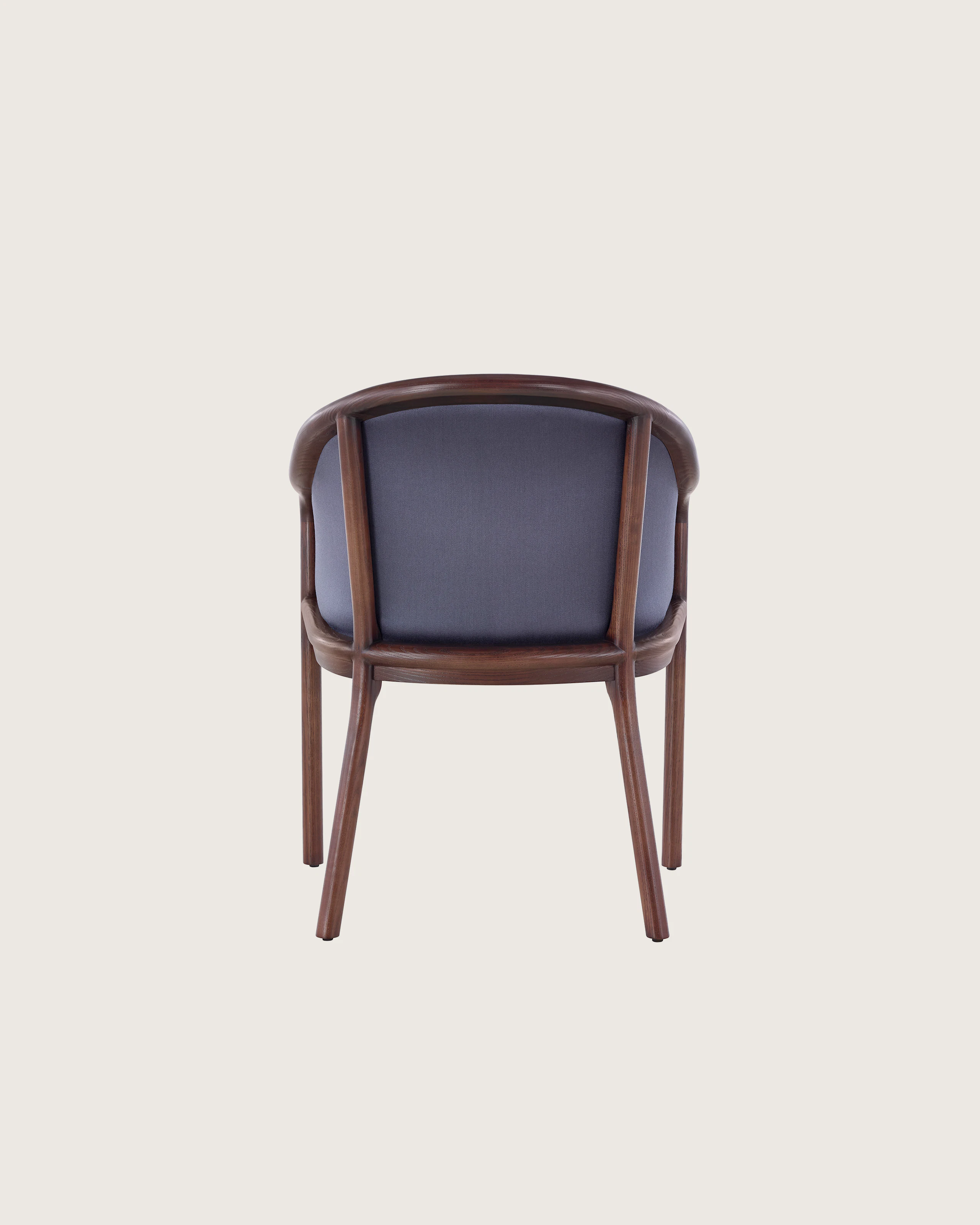 A Landmark side chair with dark blue French upholstery and a dark wood frame, viewed from behind.